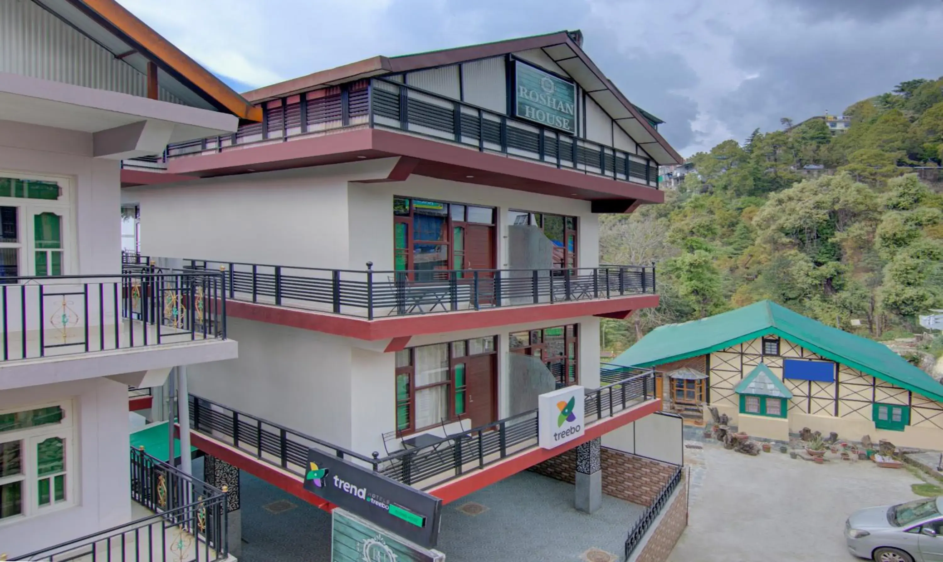 Property building in Treebo Roshan House with Valley View Property building in Treebo Roshan House with Valley View