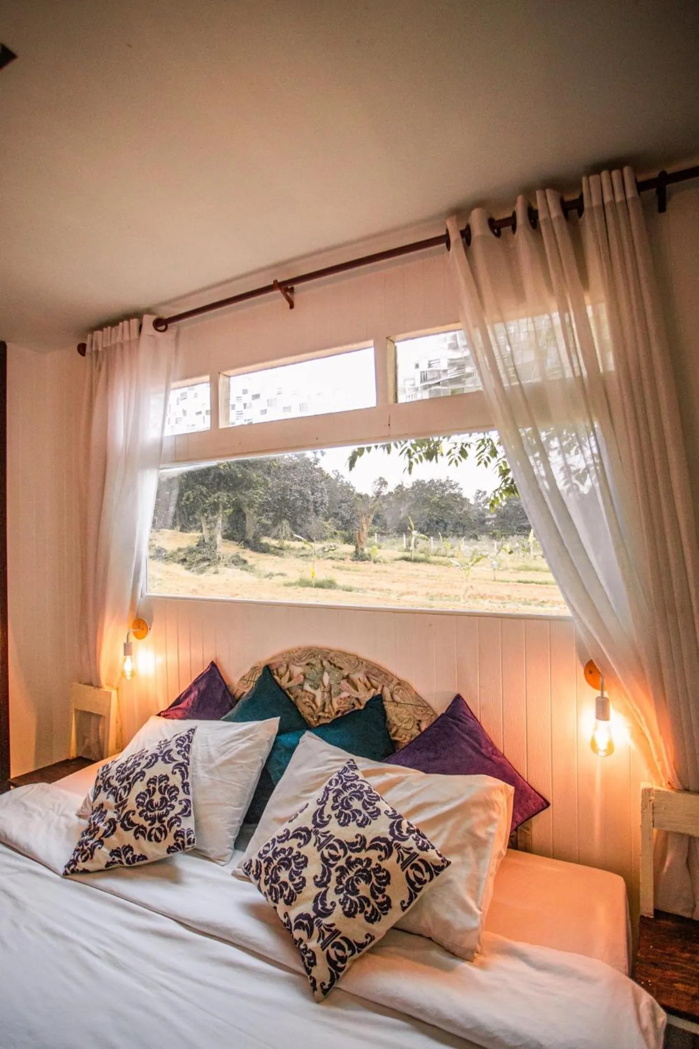 Bed in The Antique Riverside Resort