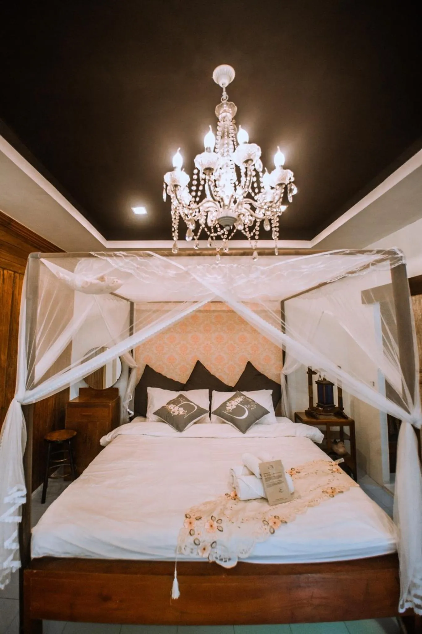 Bed in The Antique Riverside Resort