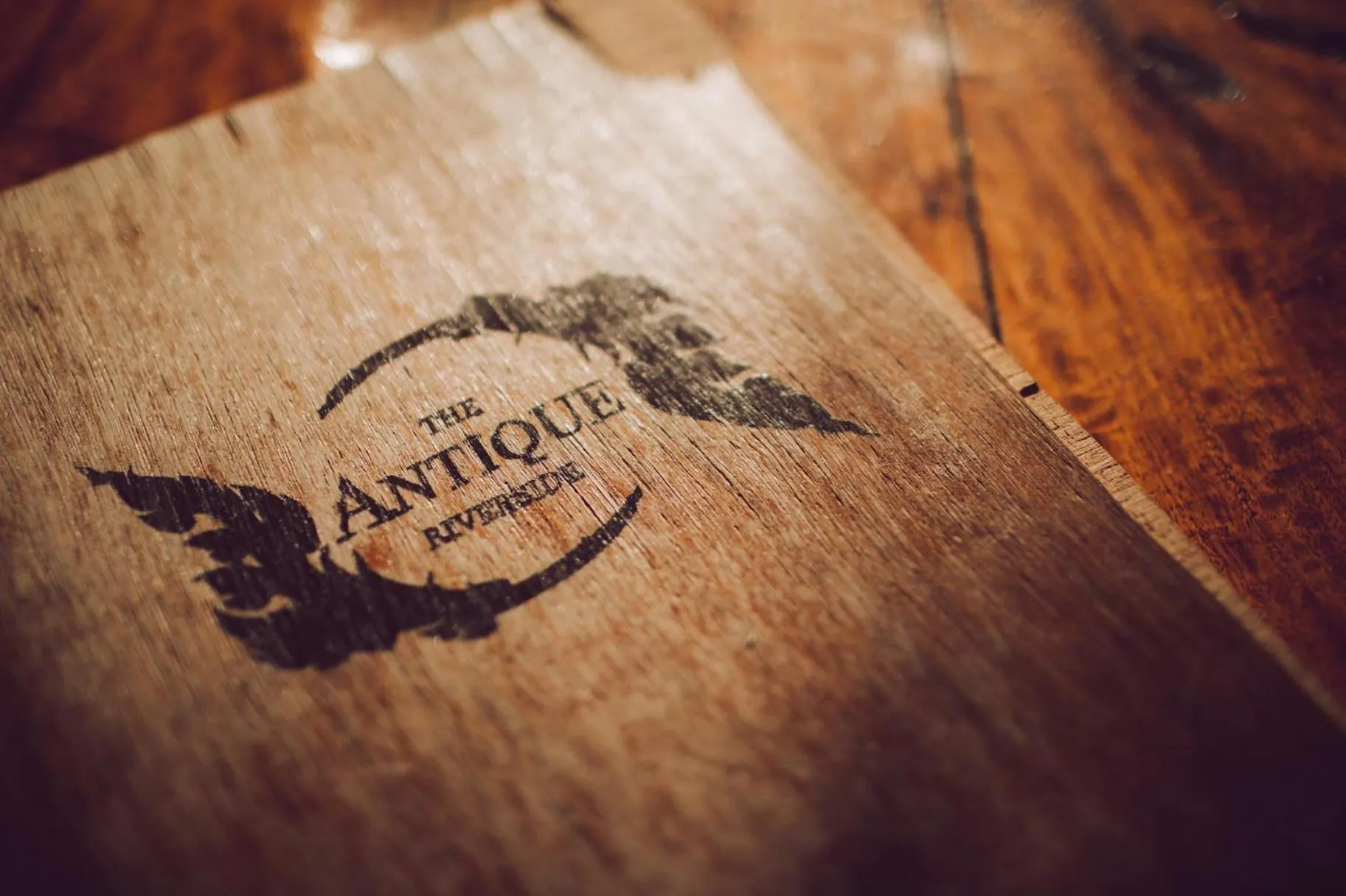 Property logo or sign in The Antique Riverside Resort