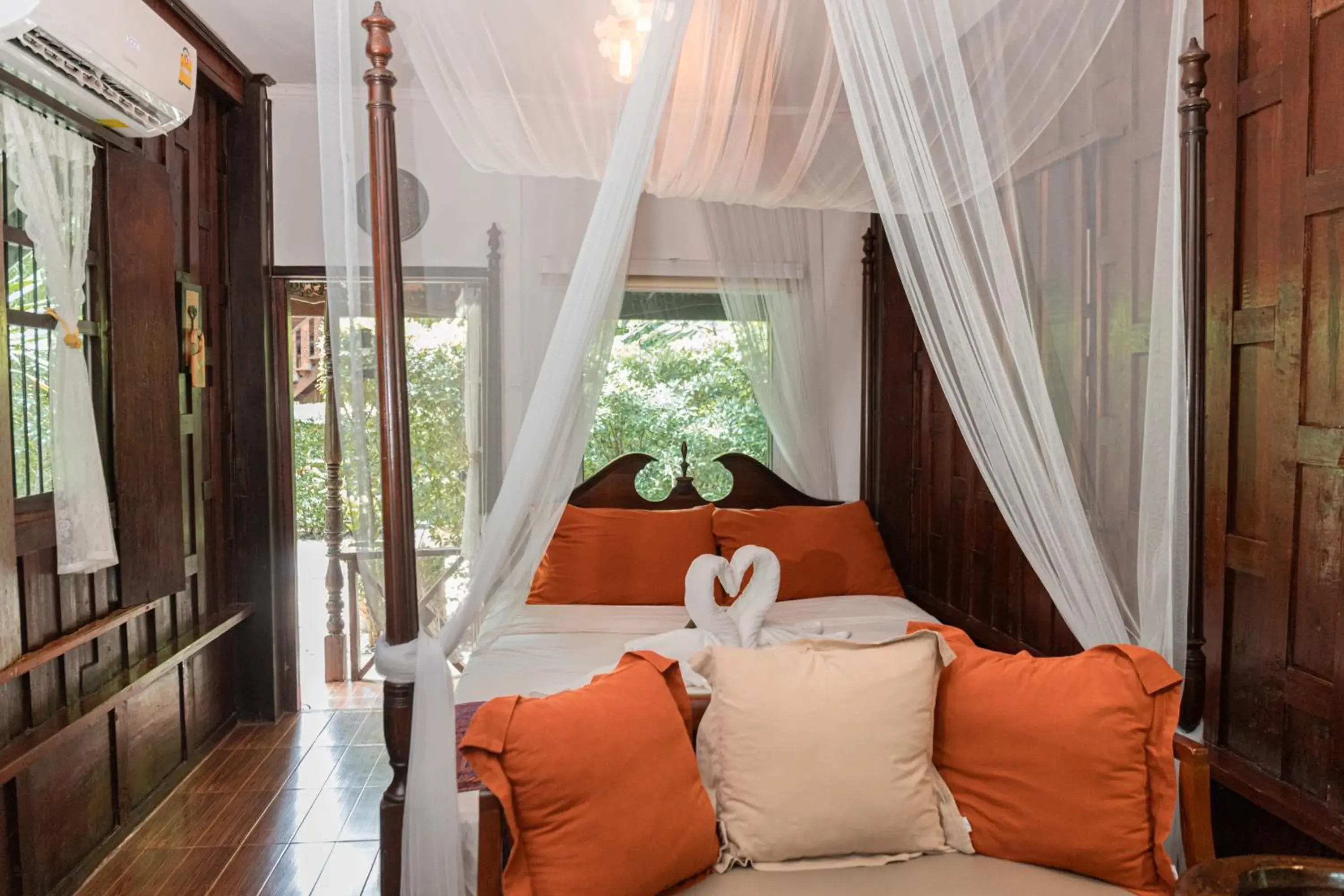 Bed in The Antique Riverside Resort Bed in The Antique Riverside Resort