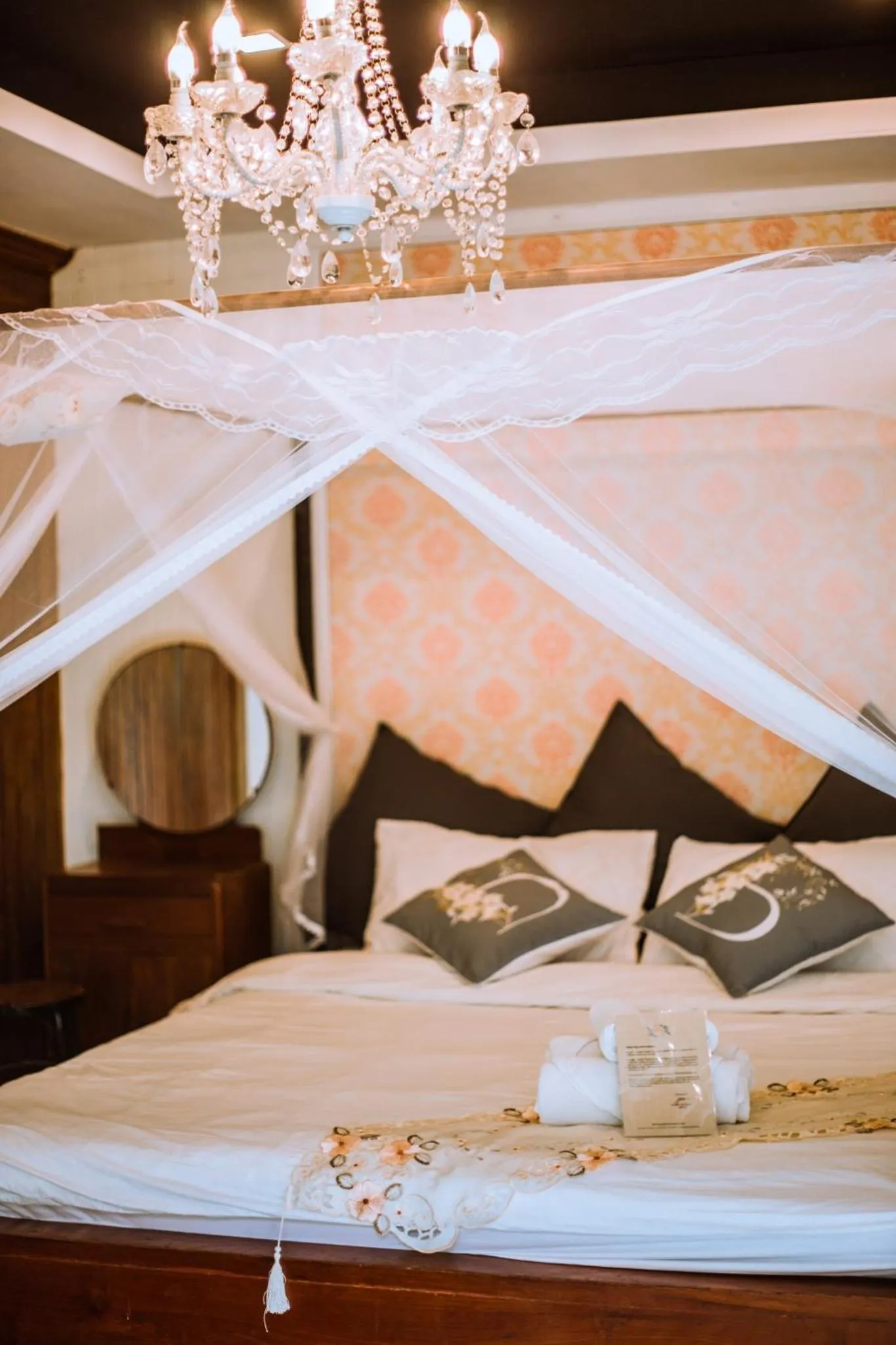 Bed in The Antique Riverside Resort