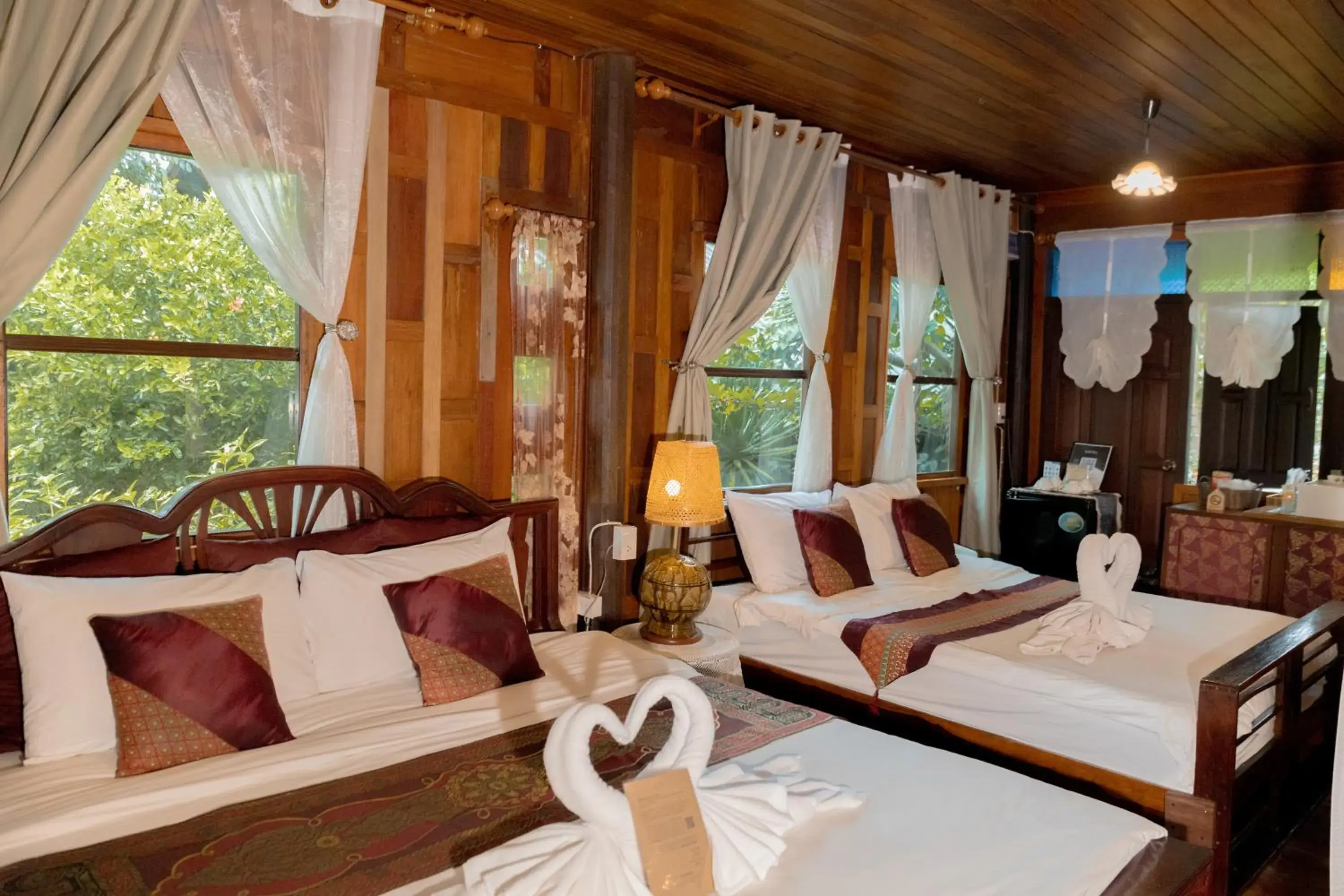 Bed in The Antique Riverside Resort Bed in The Antique Riverside Resort