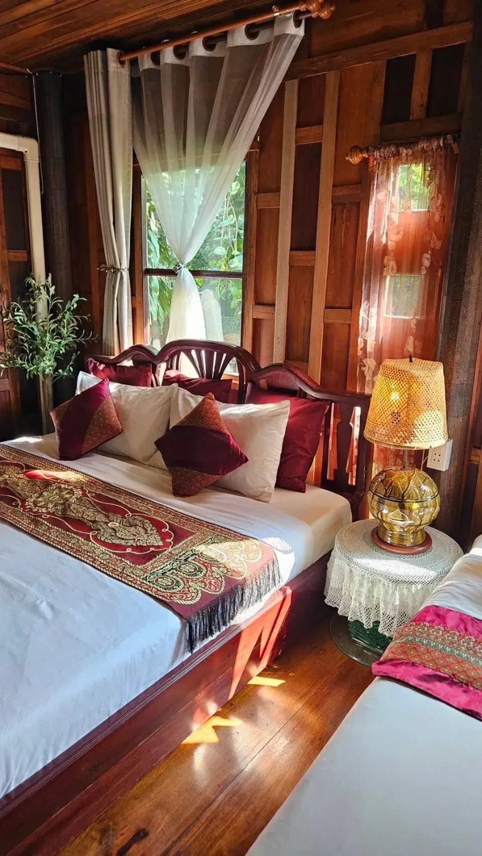 Bed in The Antique Riverside Resort Bed in The Antique Riverside Resort