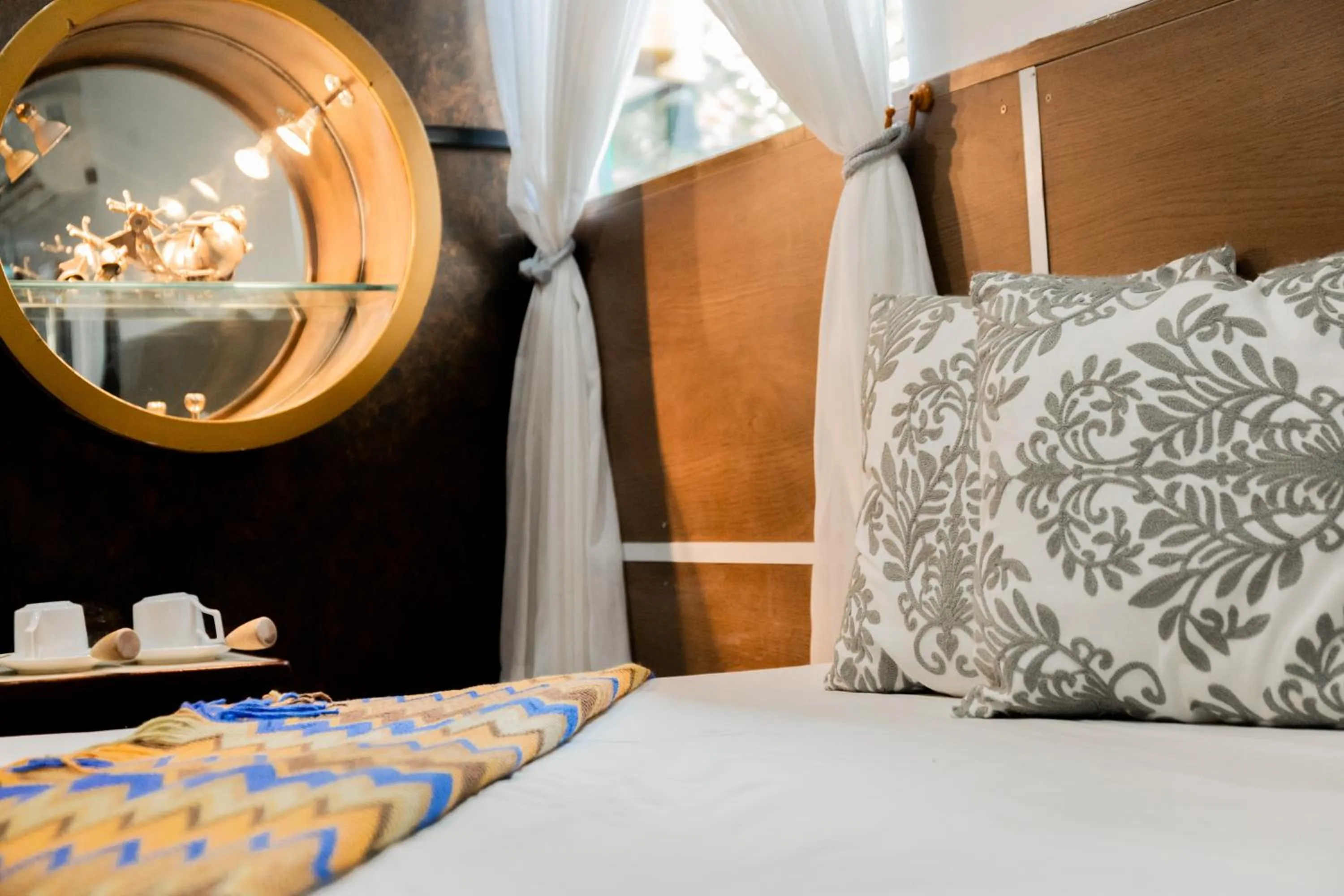 Bed in The Antique Riverside Resort