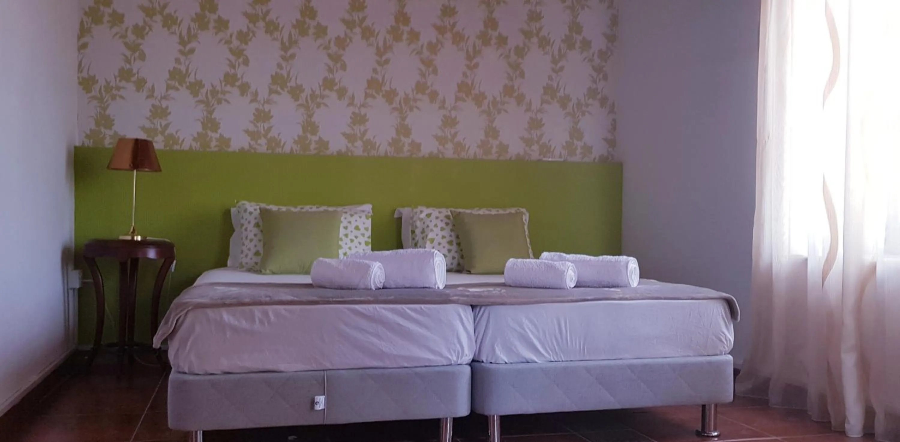 Bed in Villa Thermopilon