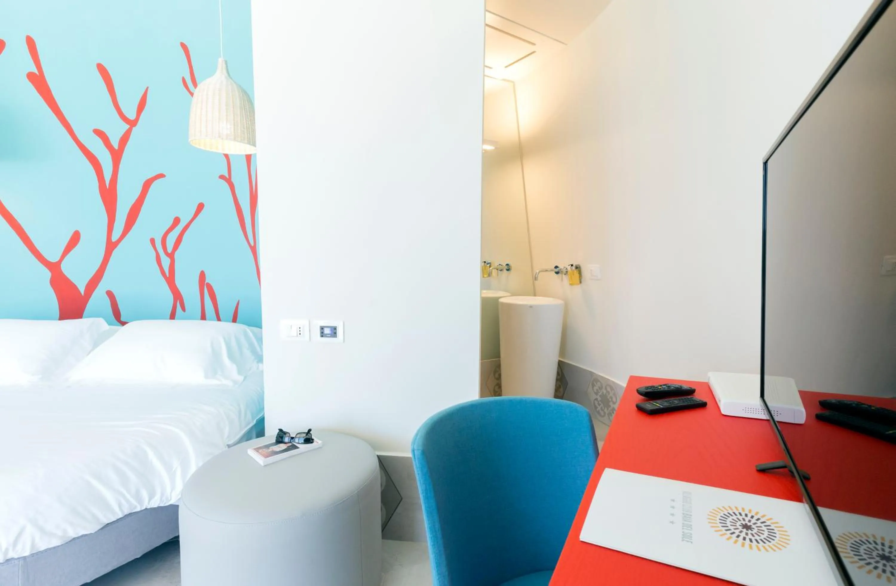 Seating area, Bed in Baia Del Sole Resort