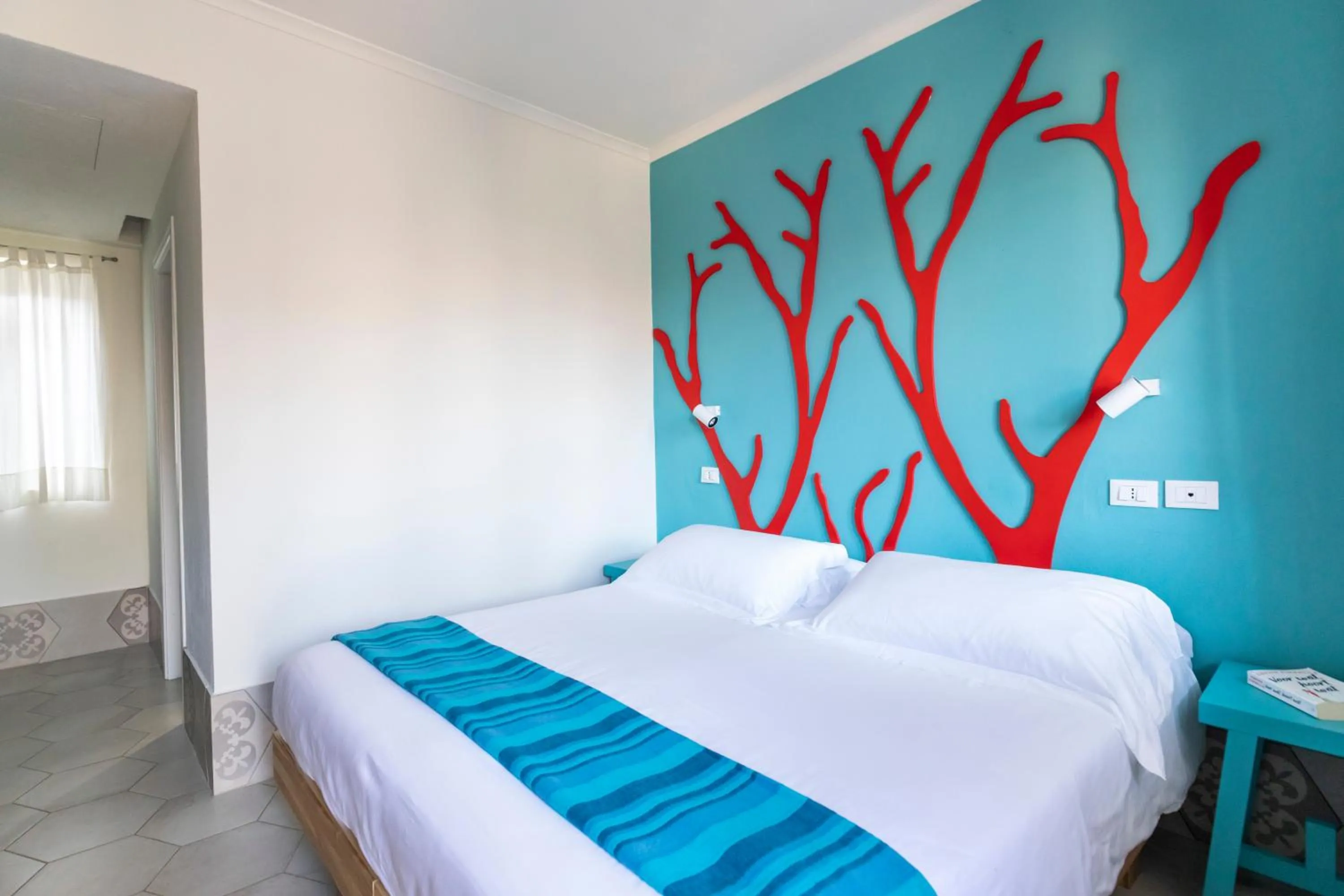 Bed in Baia Del Sole Resort