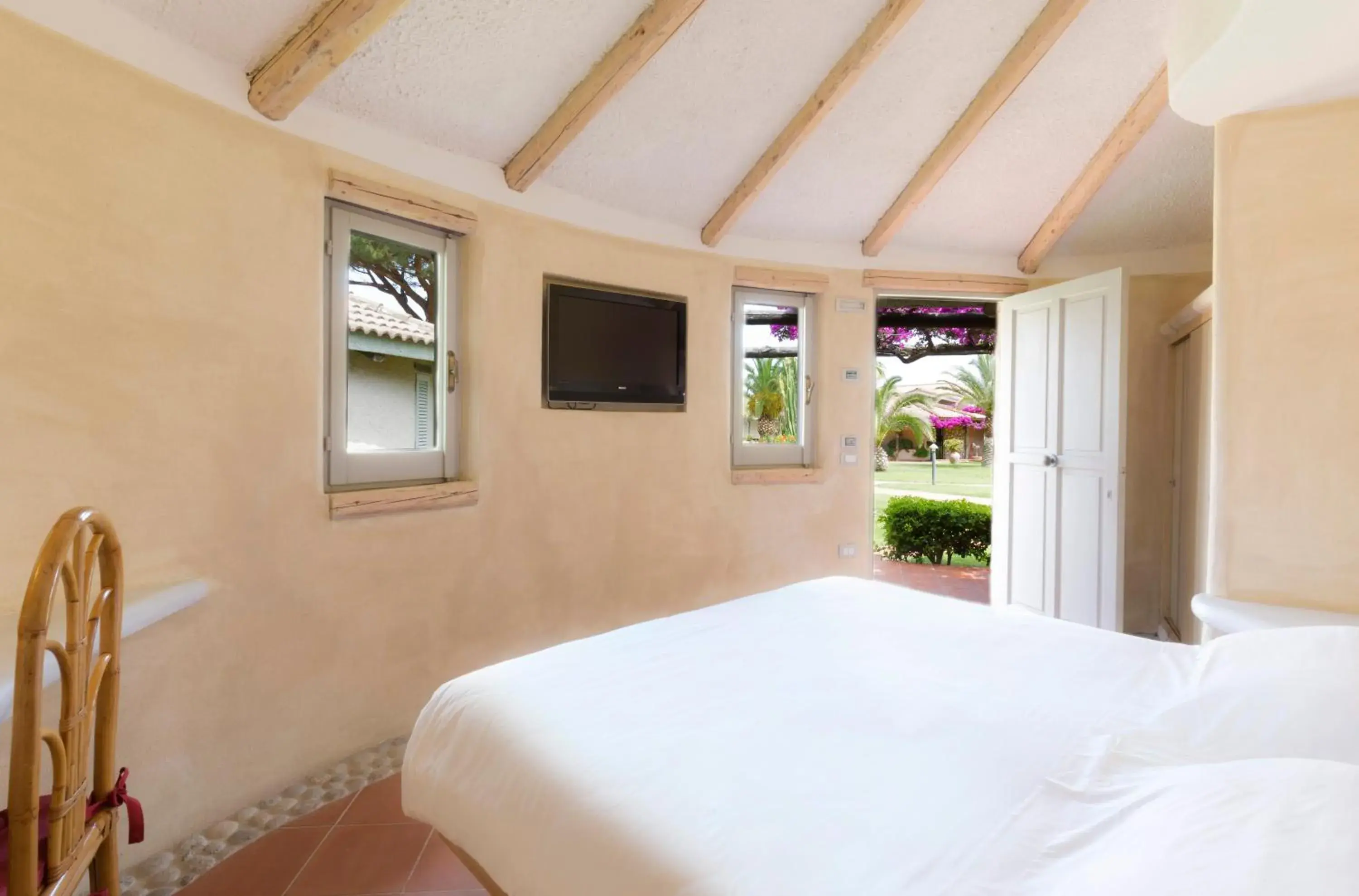 Bed in Baia Del Sole Resort Bed in Baia Del Sole Resort