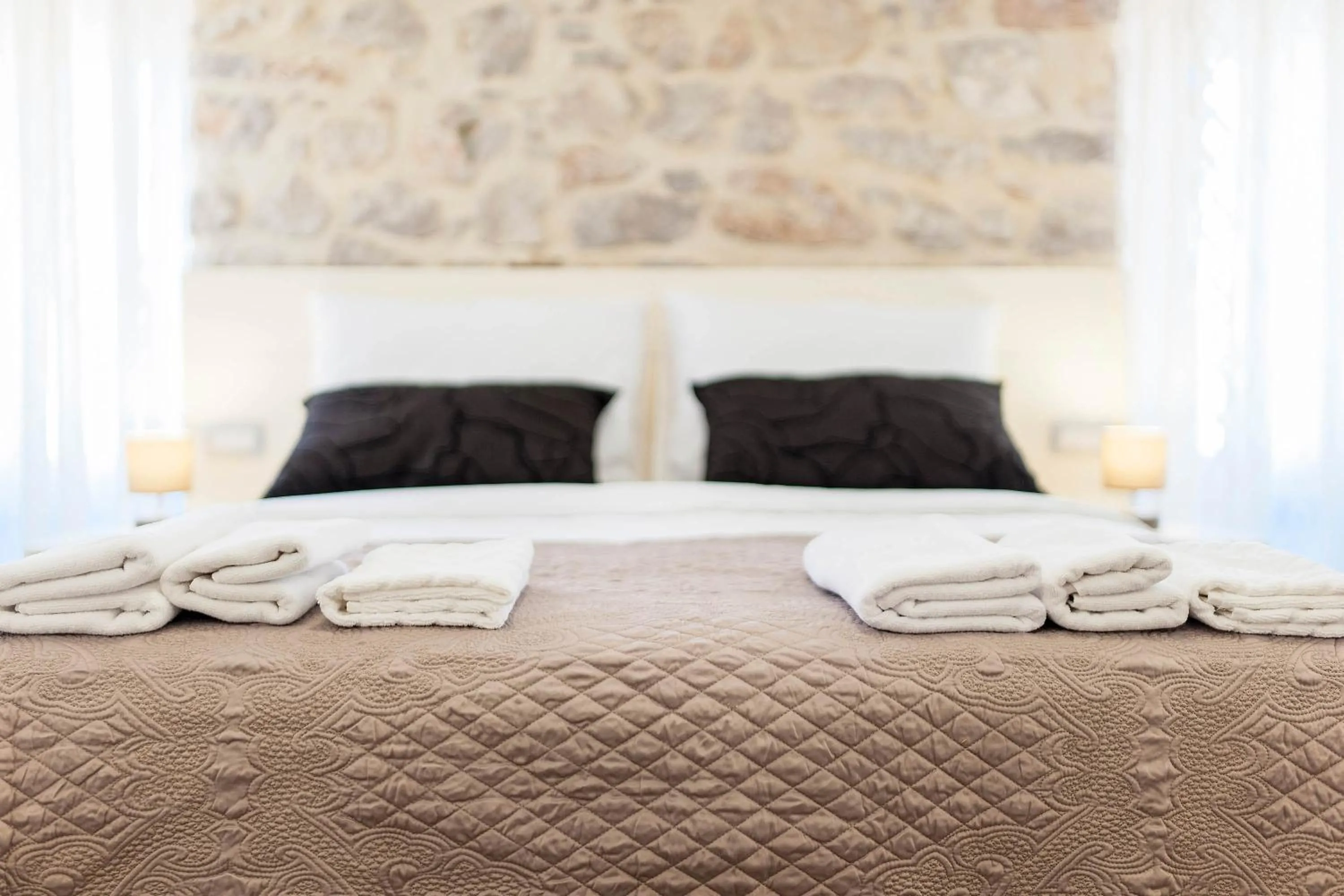 Bed in Rialto luxury rooms and apartments