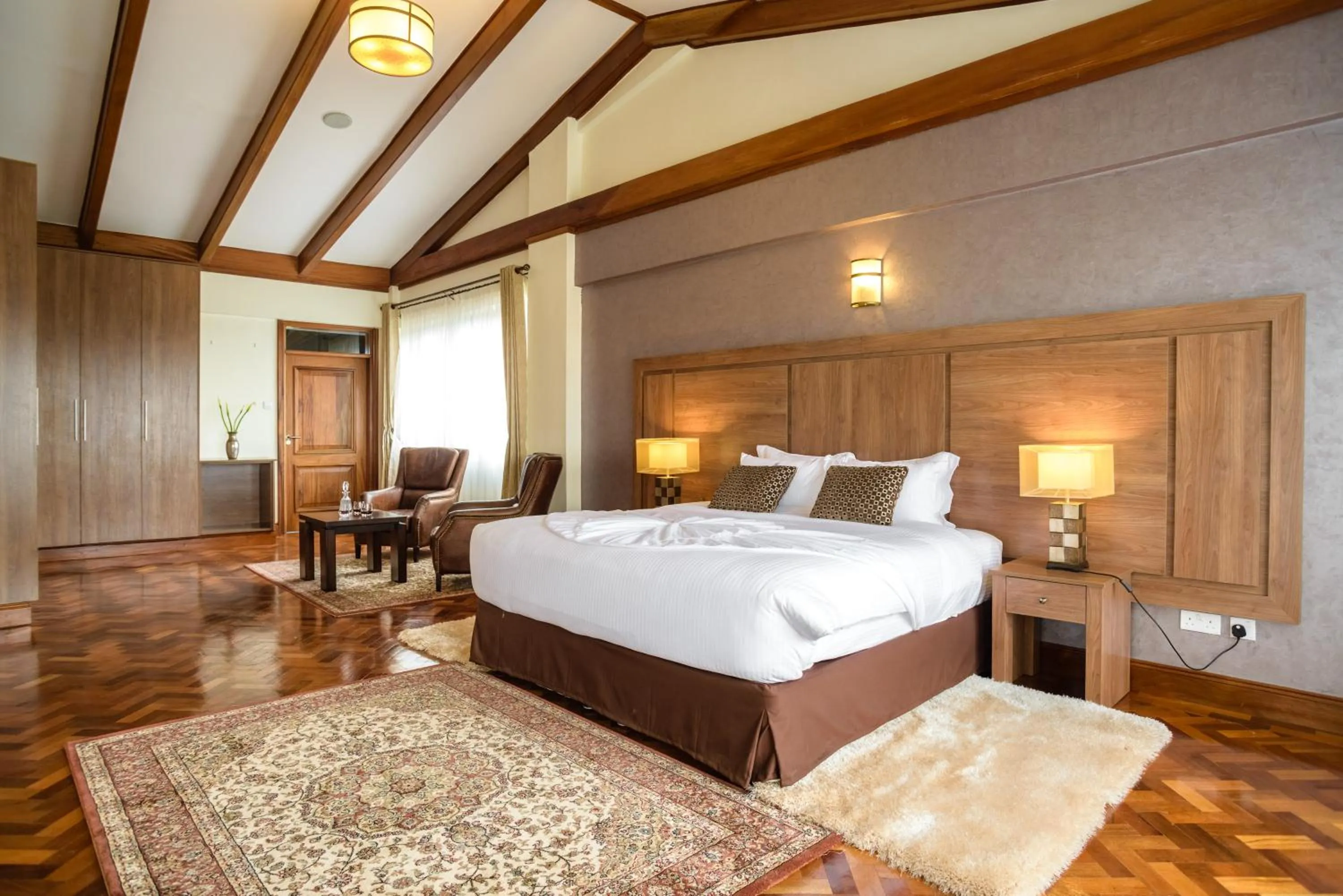 Seating area, Bed in GemSuites Riverside Serviced Apartments and Hotel, Nairobi