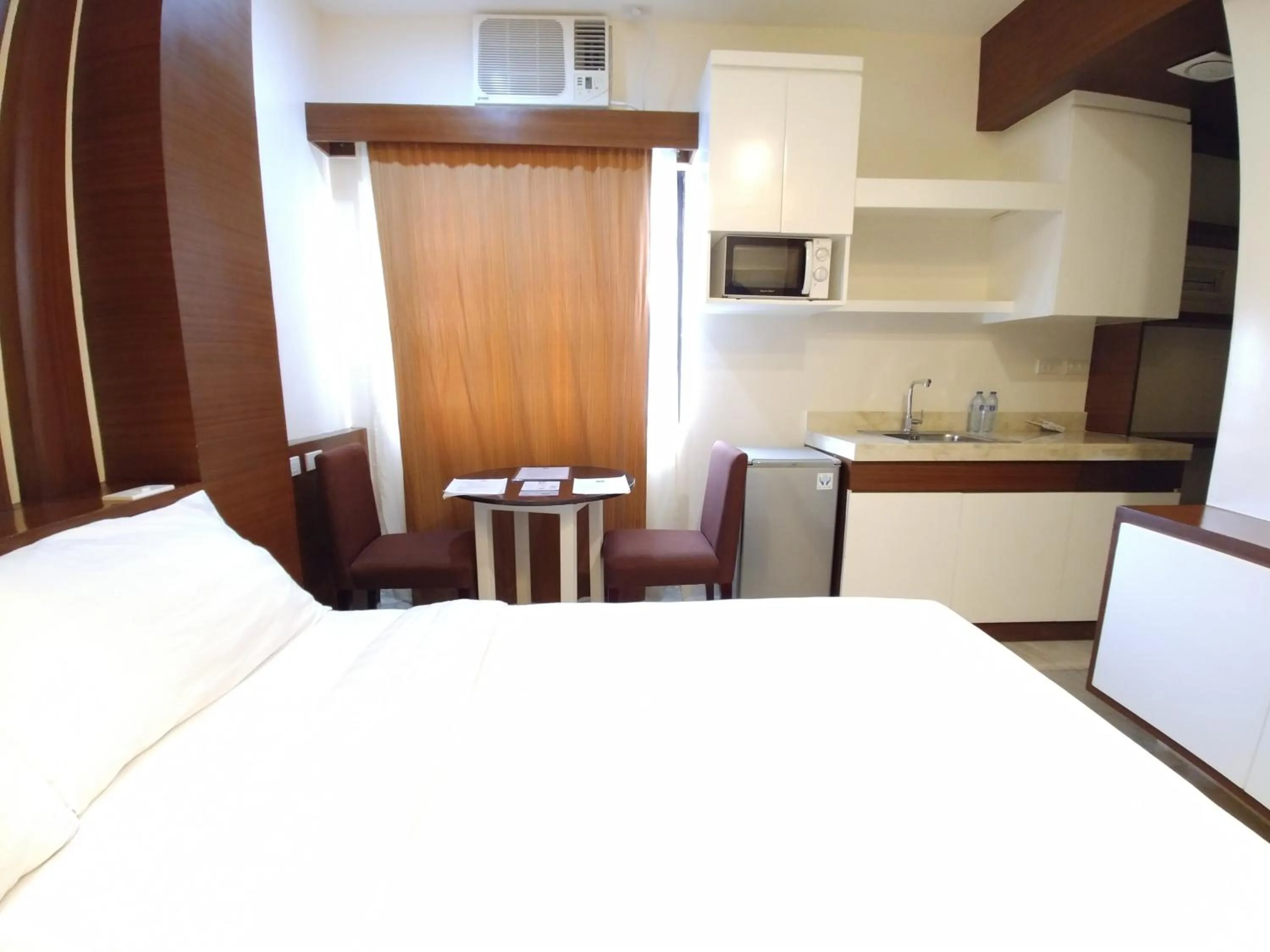 Bed in Bed and Bath Serviced Suites