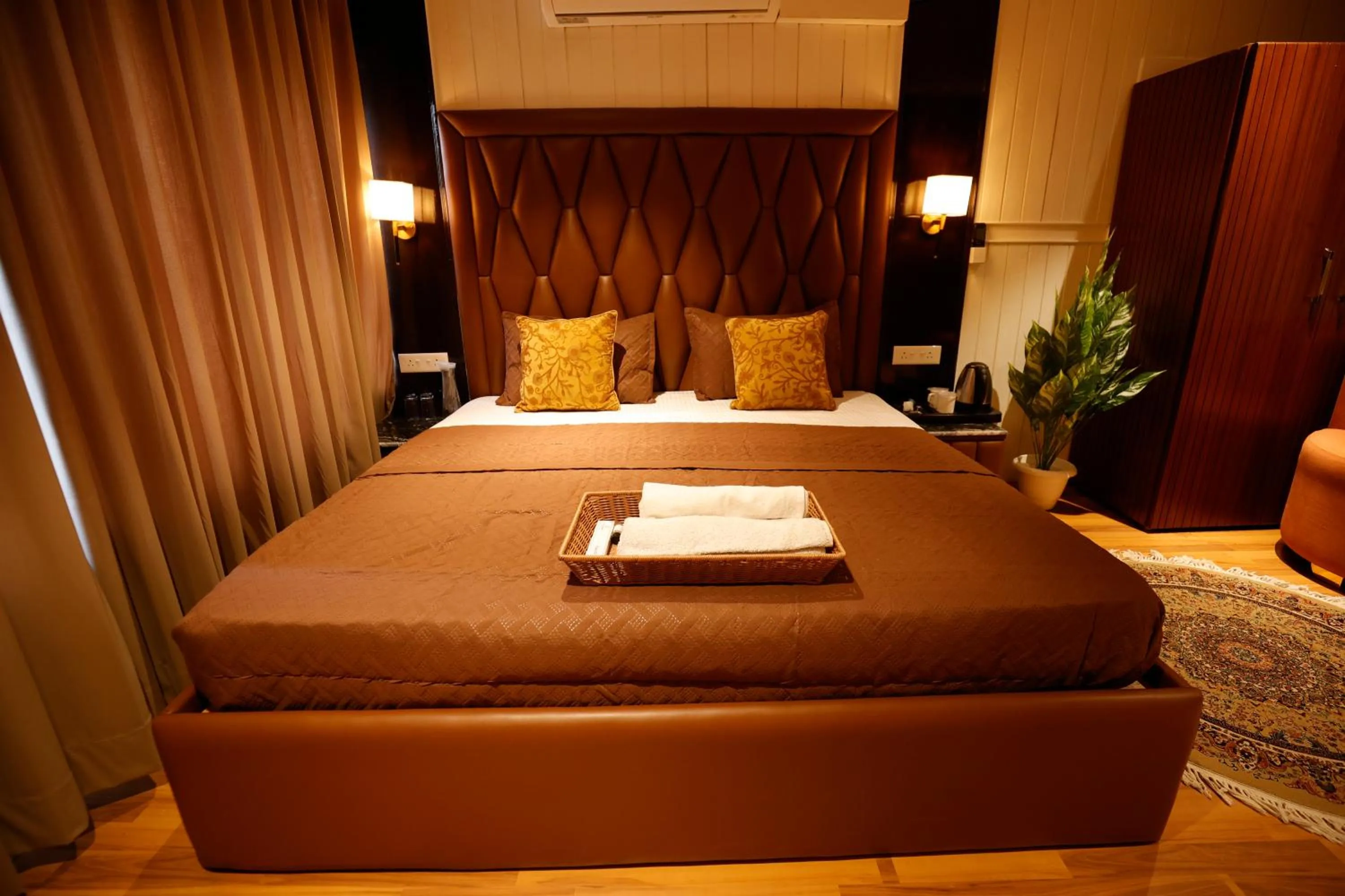 Bed in Walisons Peace Resort