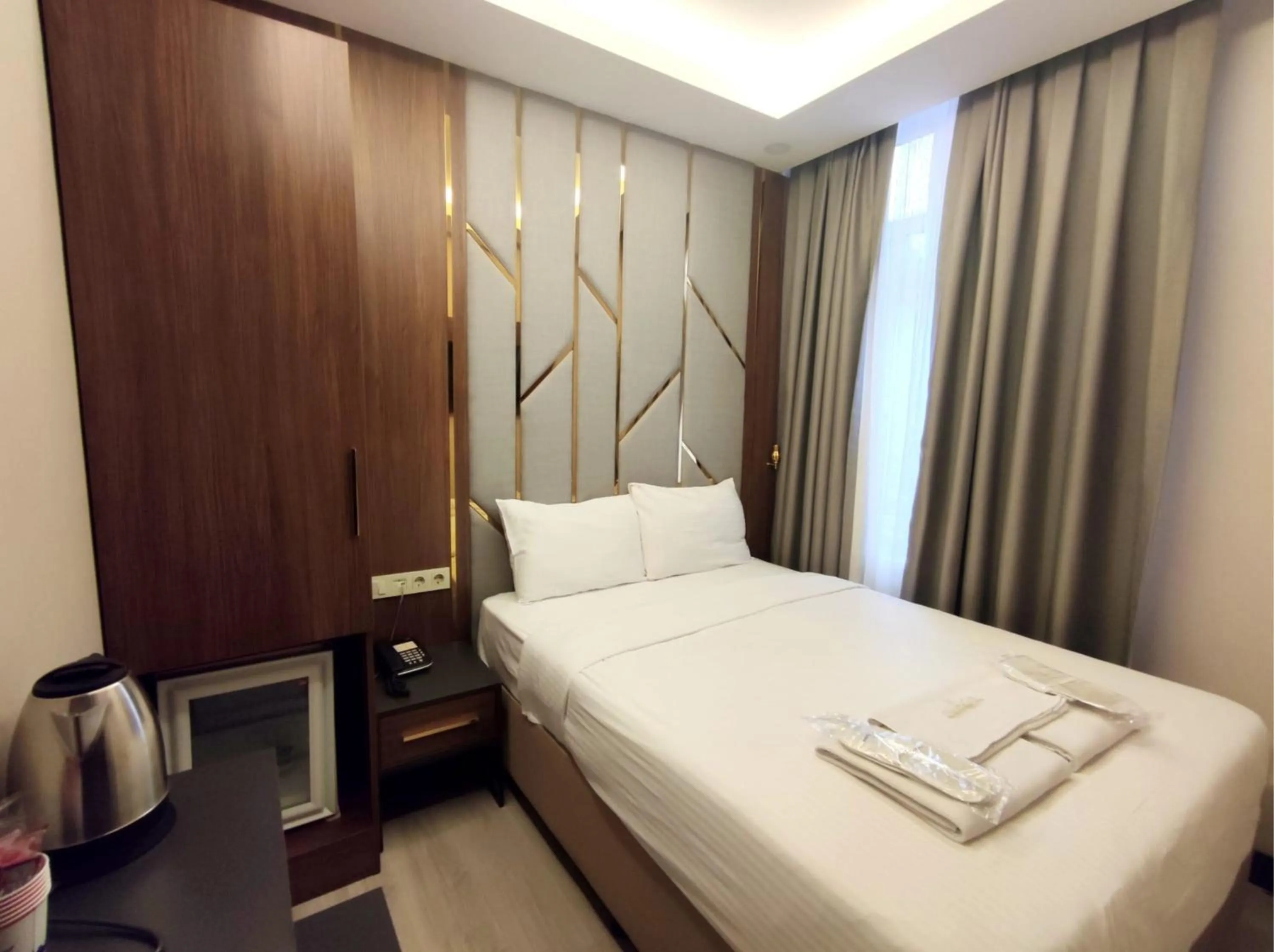 Bed in The Golden Pera's Hotel & Spa