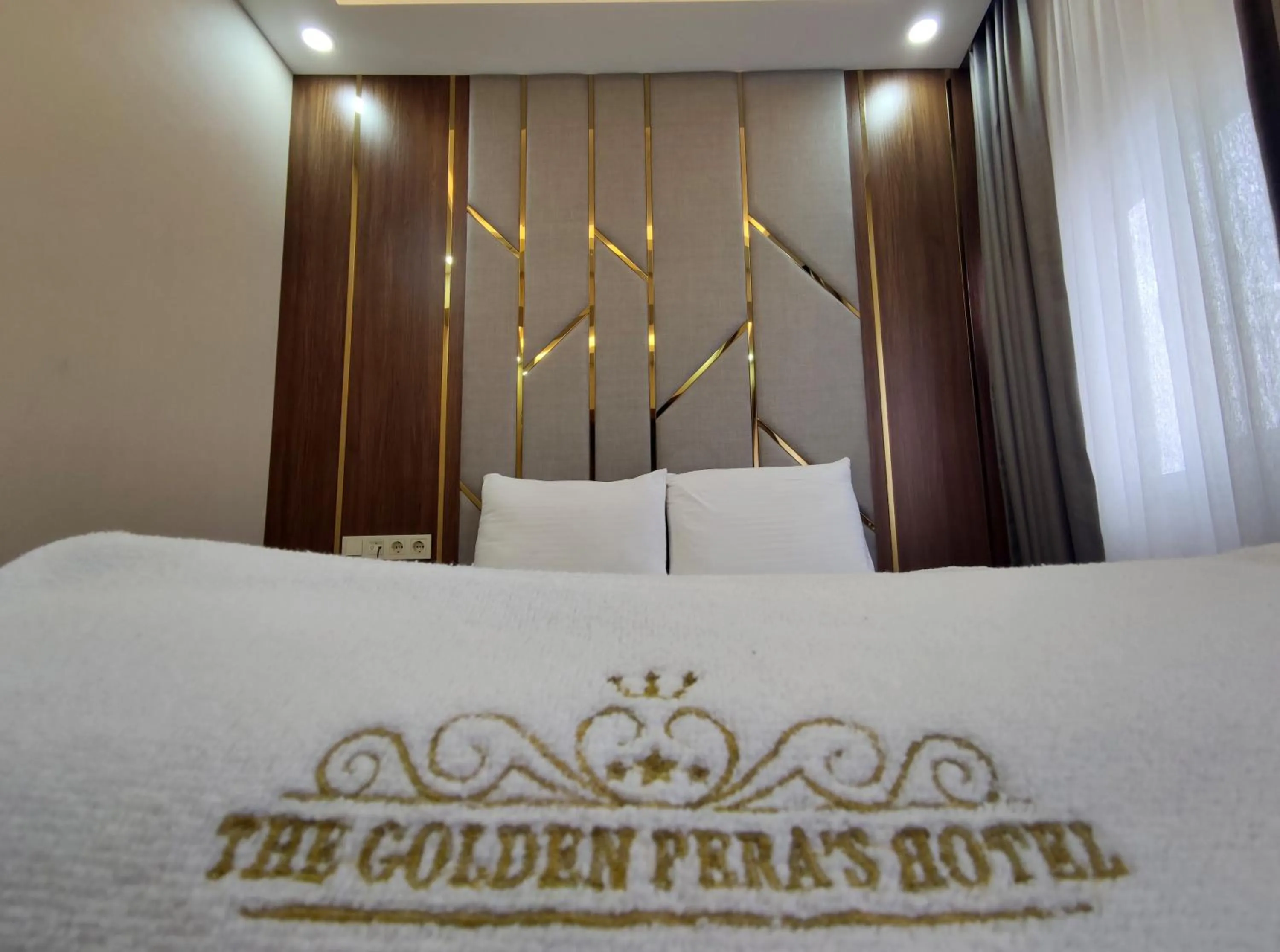 Bed in The Golden Pera's Hotel & Spa