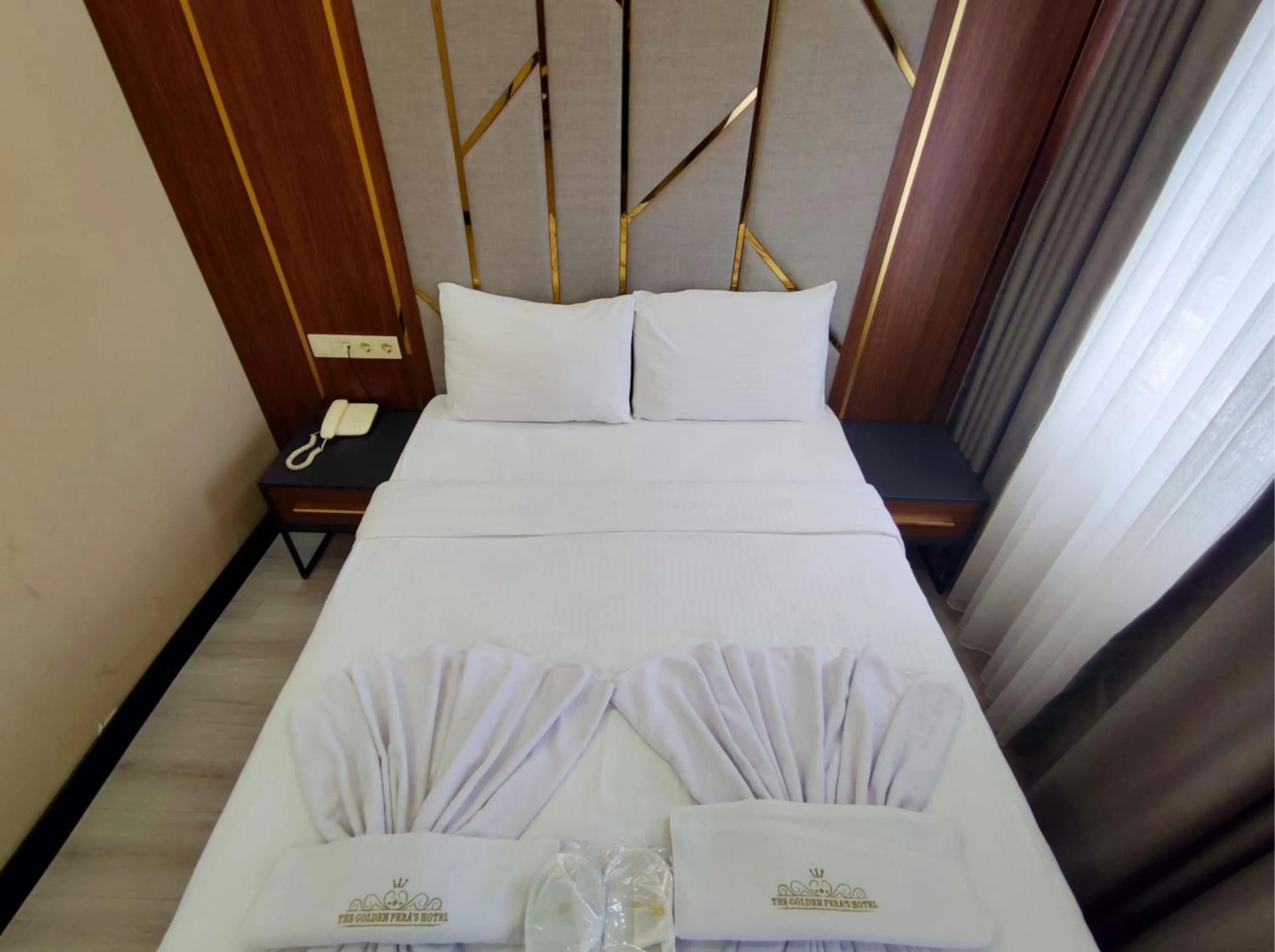Bed in The Golden Pera's Hotel & Spa