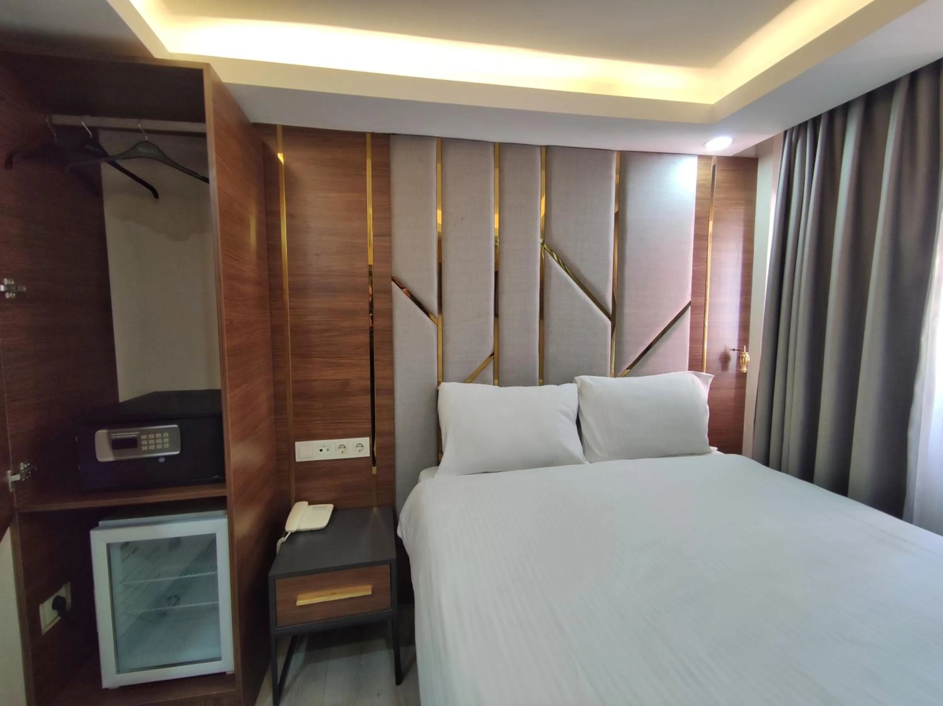 Bed in The Golden Pera's Hotel & Spa