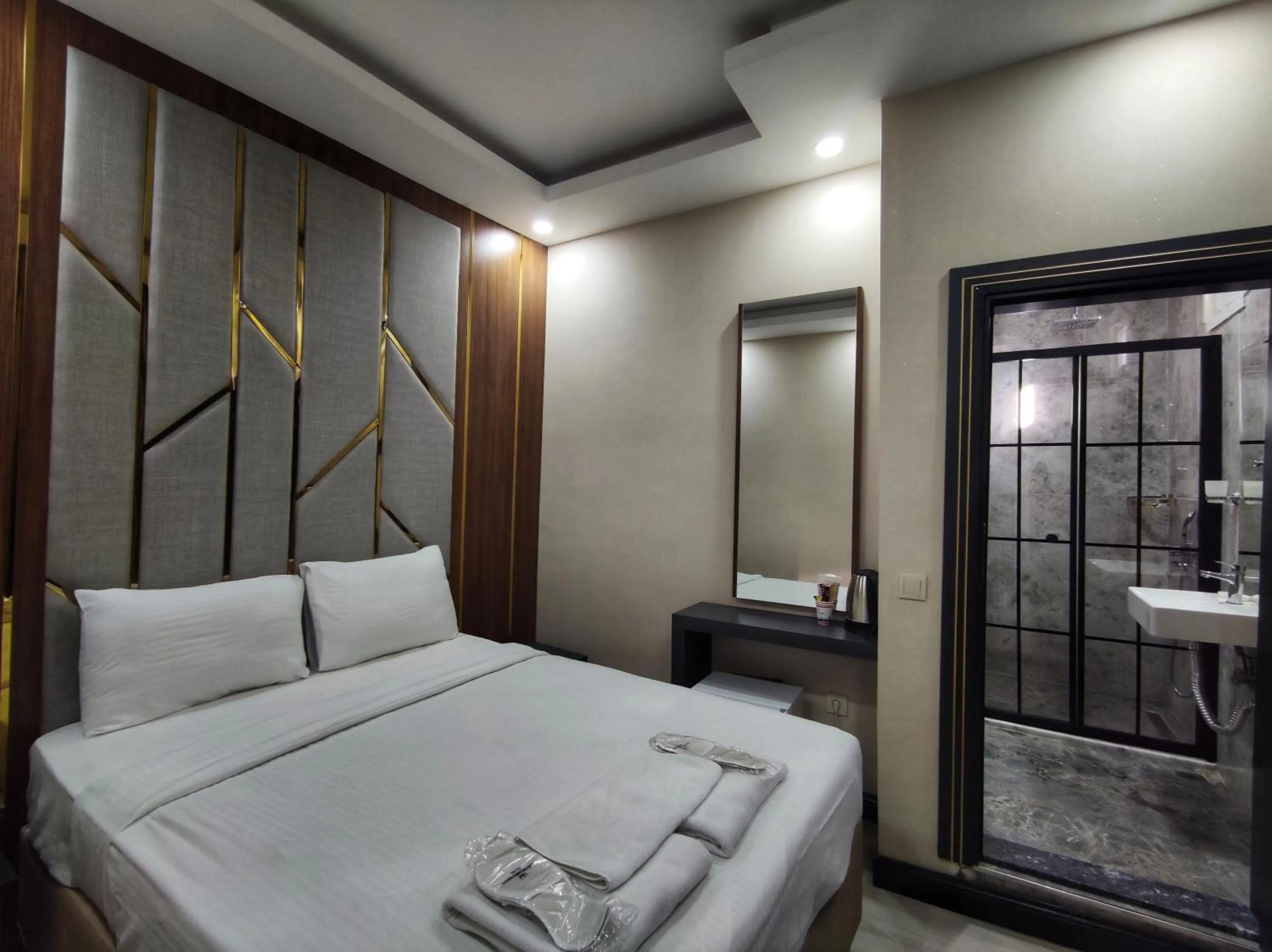 Bed in The Golden Pera's Hotel & Spa