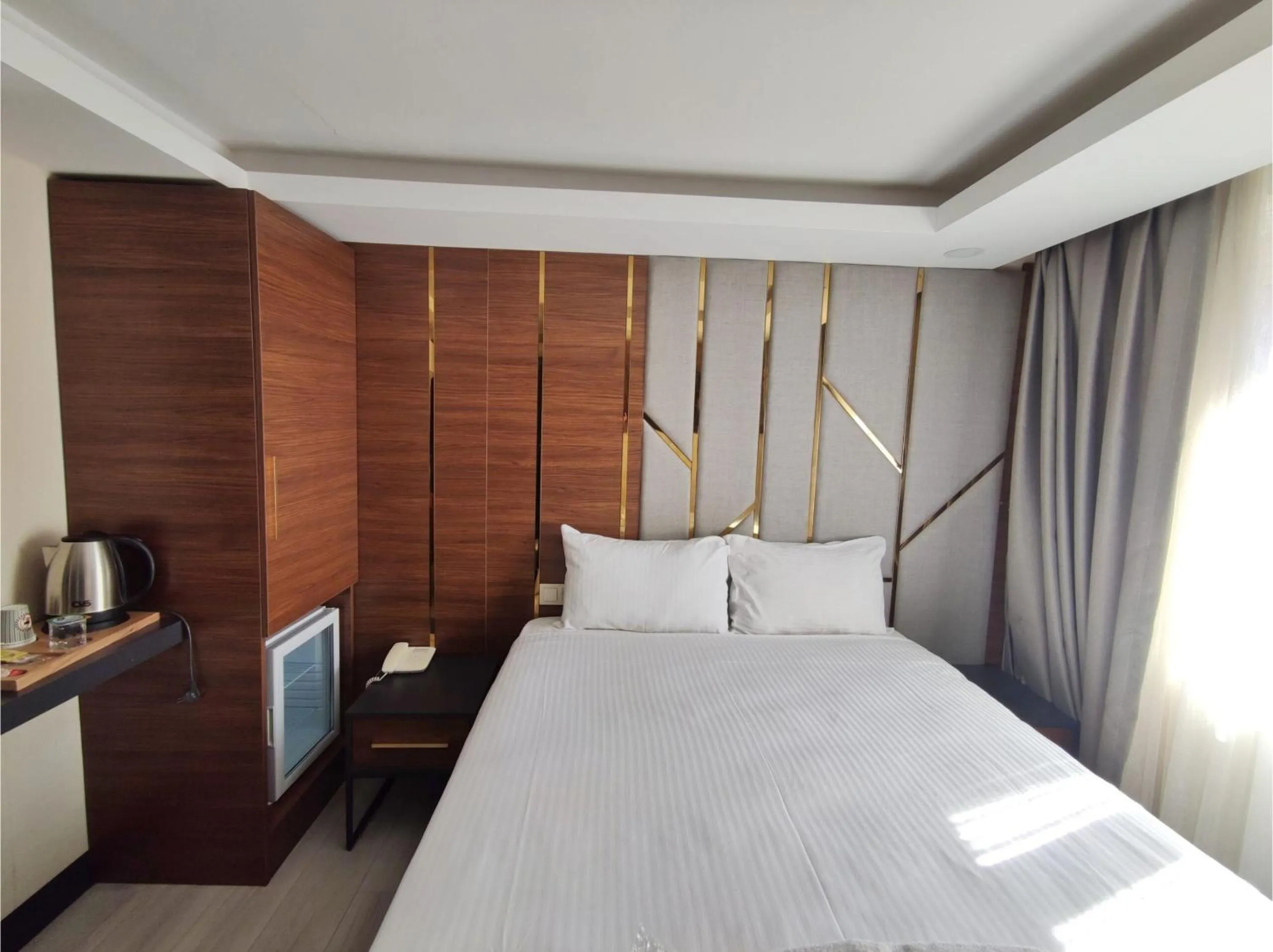 Bed in The Golden Pera's Hotel & Spa