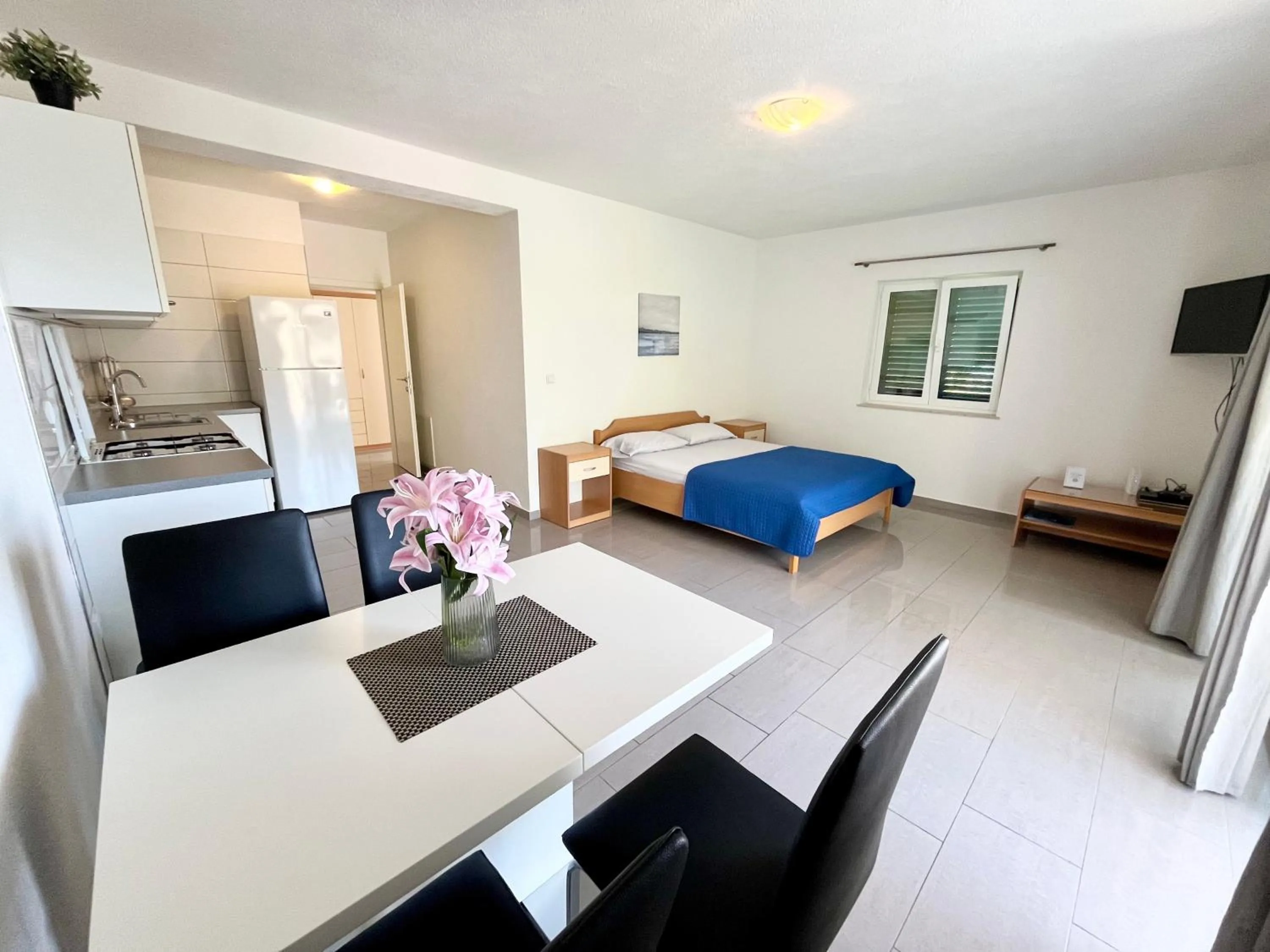 Bed in Paradise Apartments - Robinson getaway
