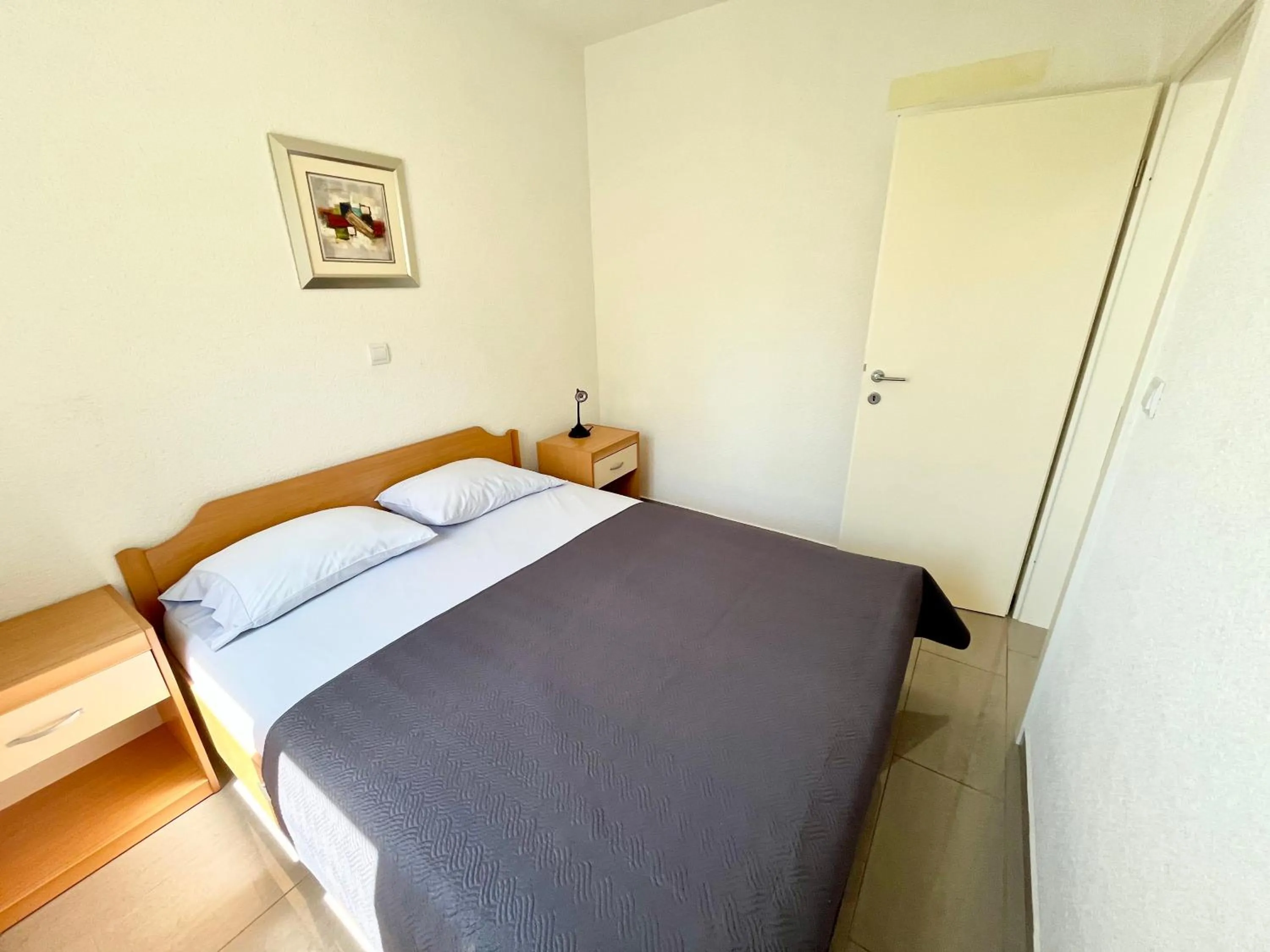 Bed in Paradise Apartments - Robinson getaway