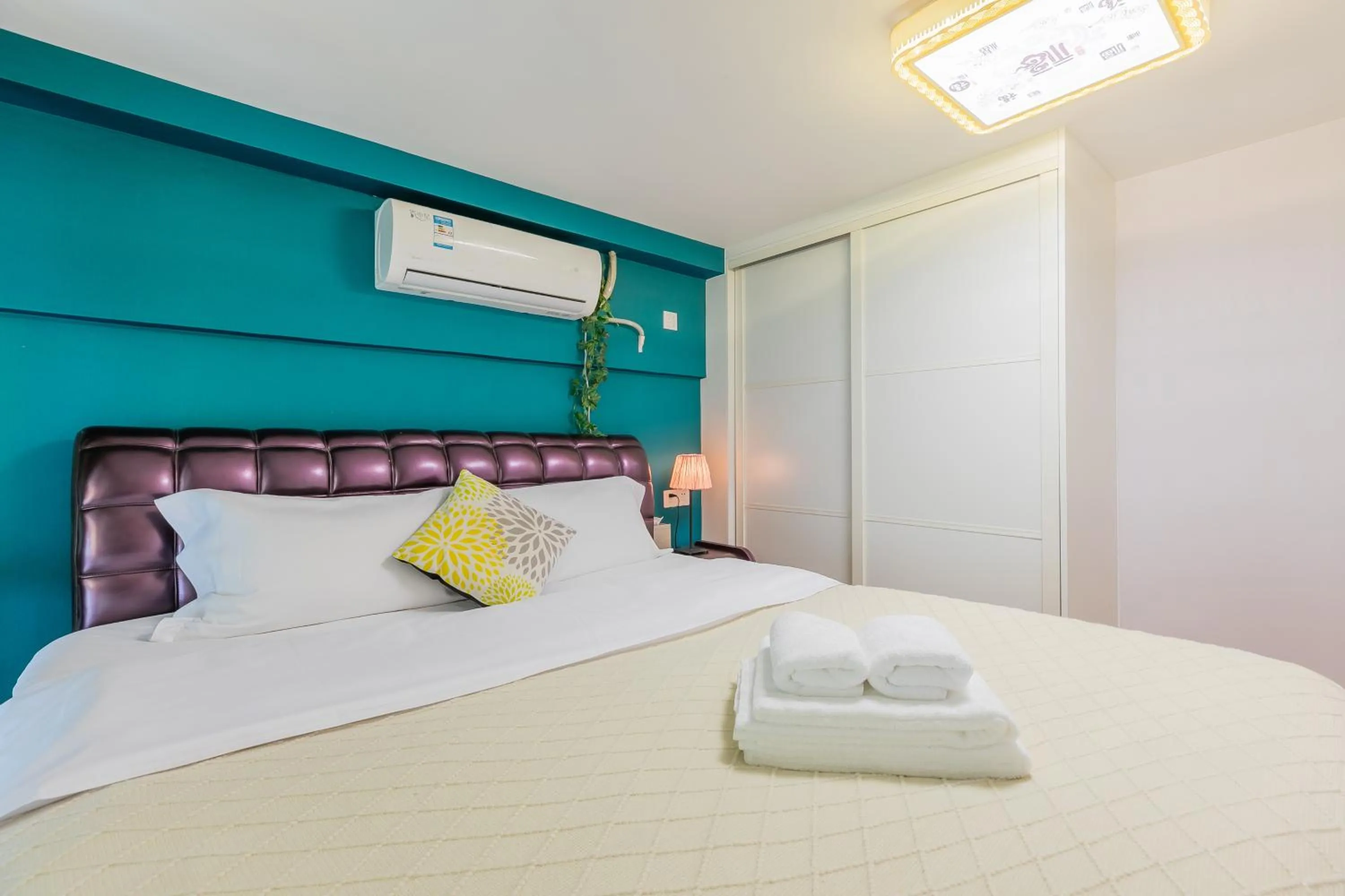 Bed in Lavender Apartment Branch