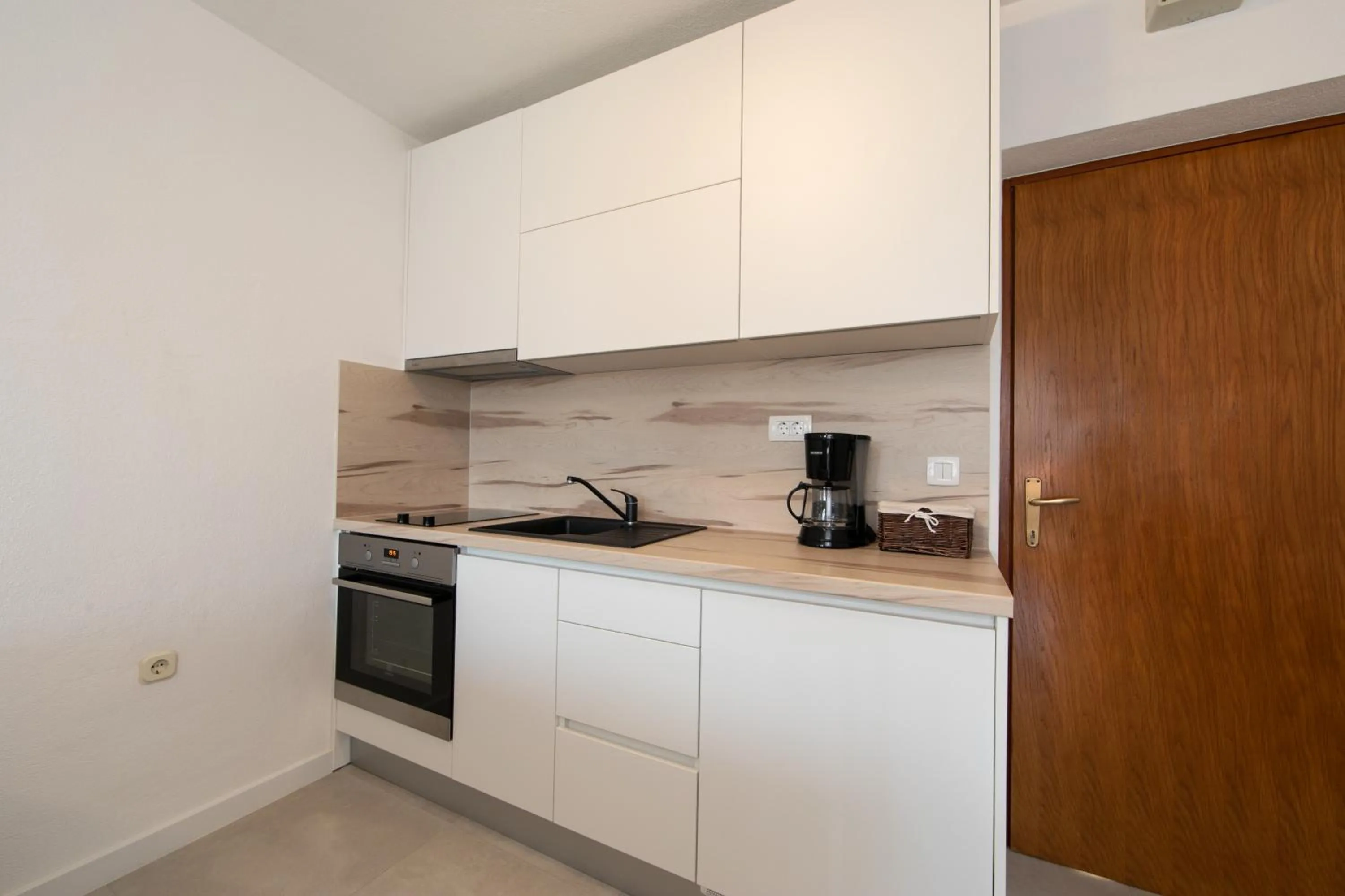 Kitchen or kitchenette in Apartments Villa Mili