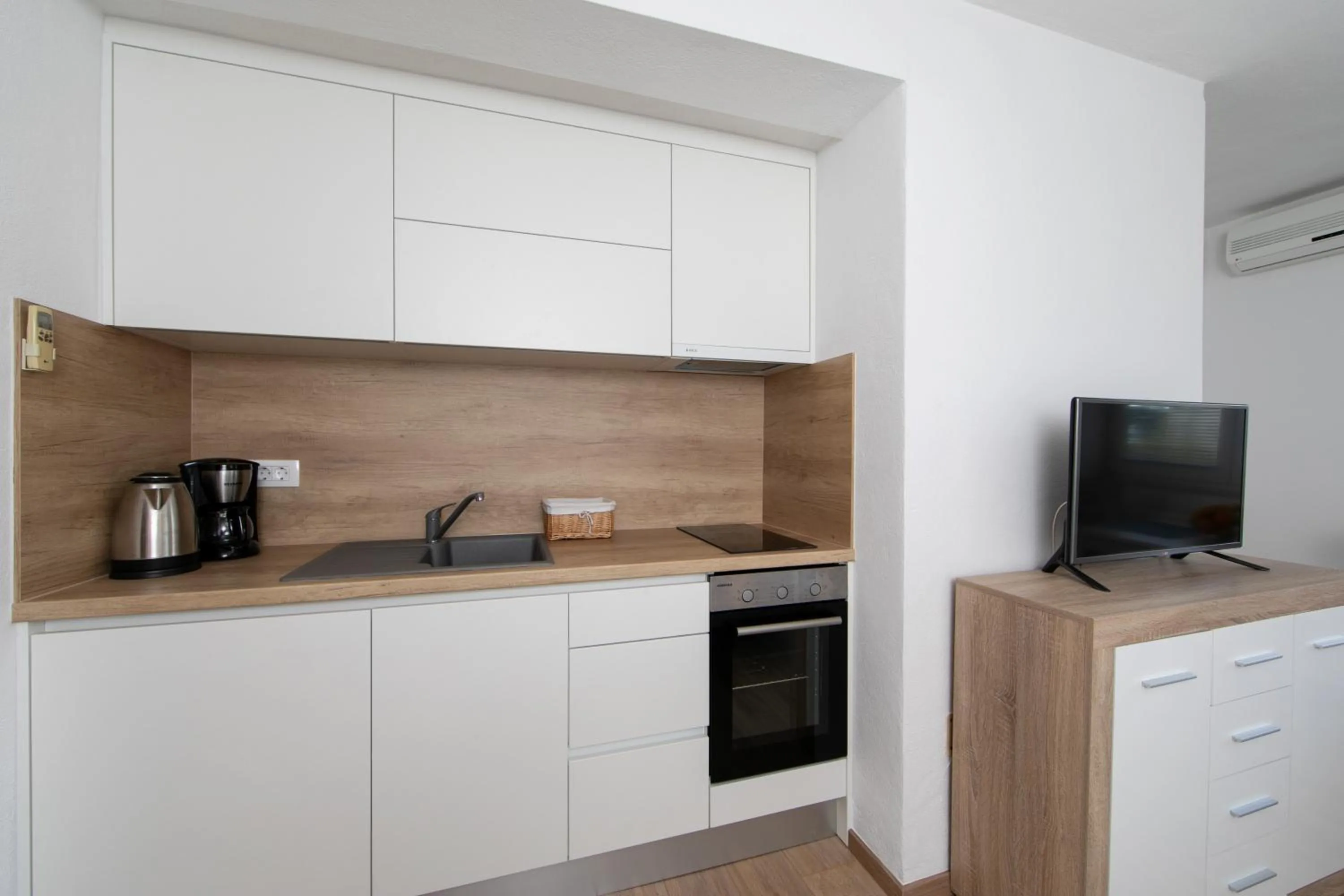 Kitchen or kitchenette in Apartments Villa Mili