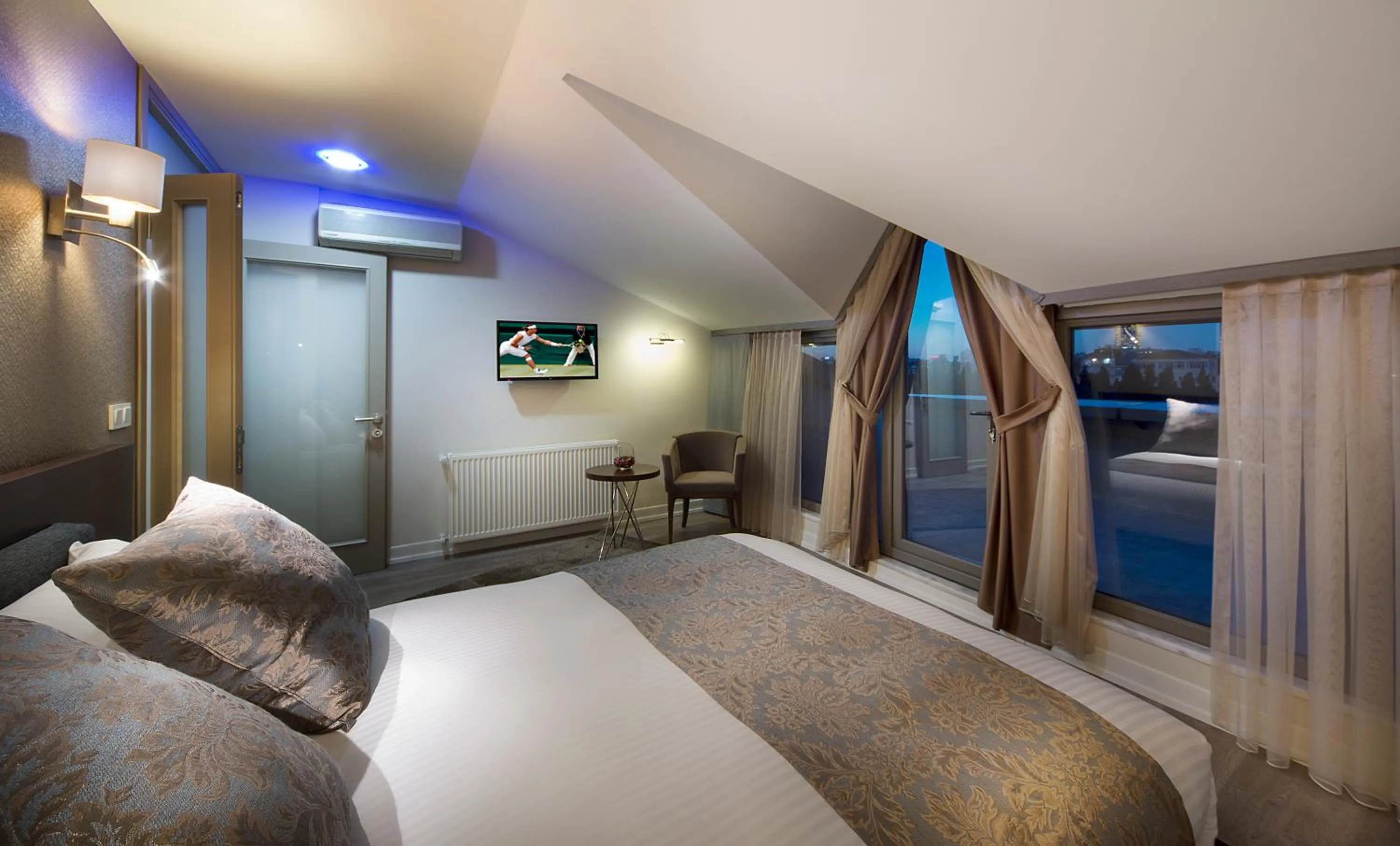 Bed in The Clock Suites