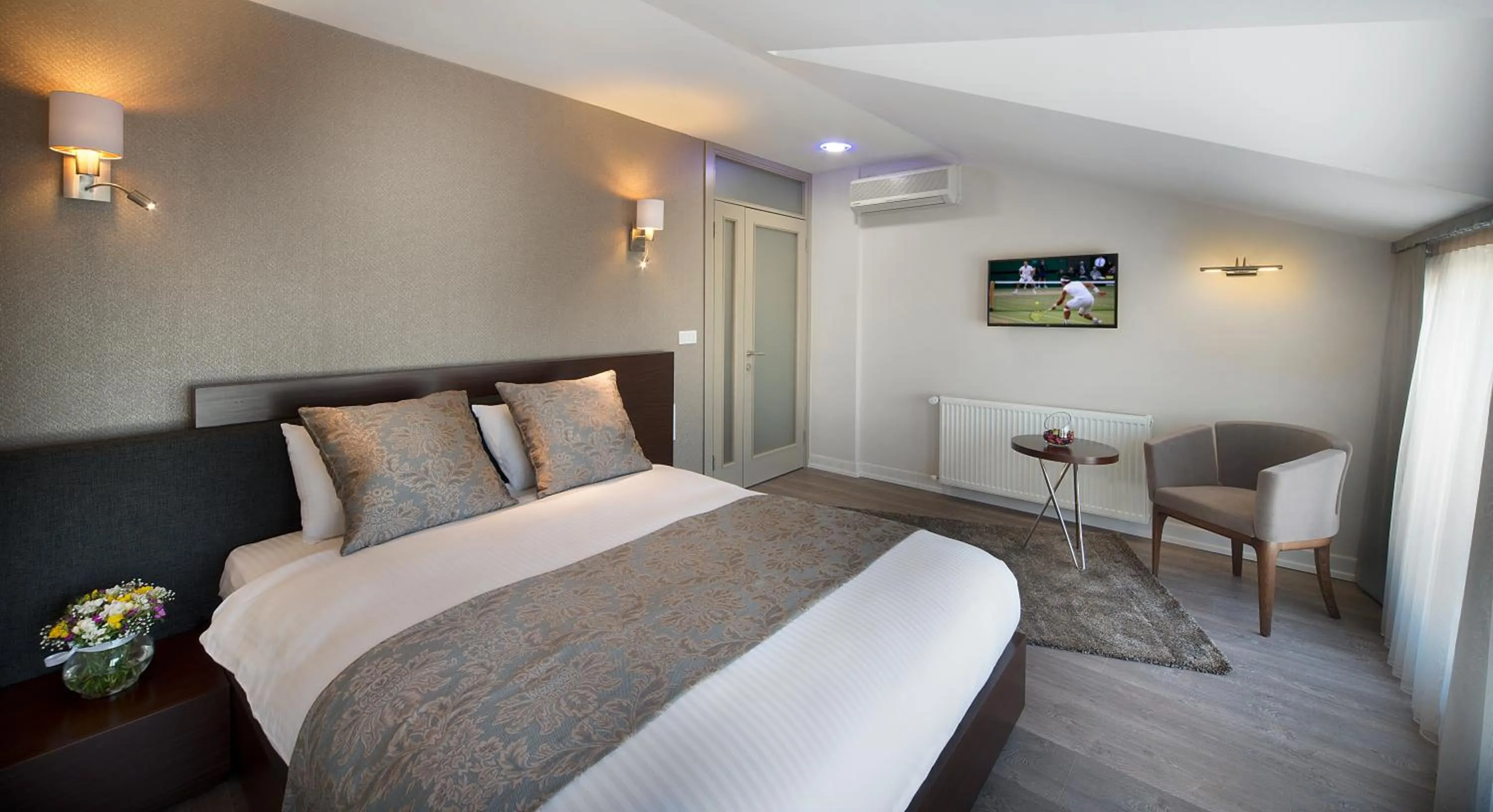 Bed in The Clock Suites