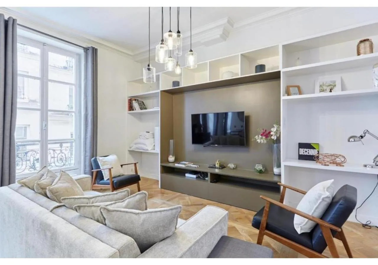 Living room in Apartment Le Marais by Studio prestige