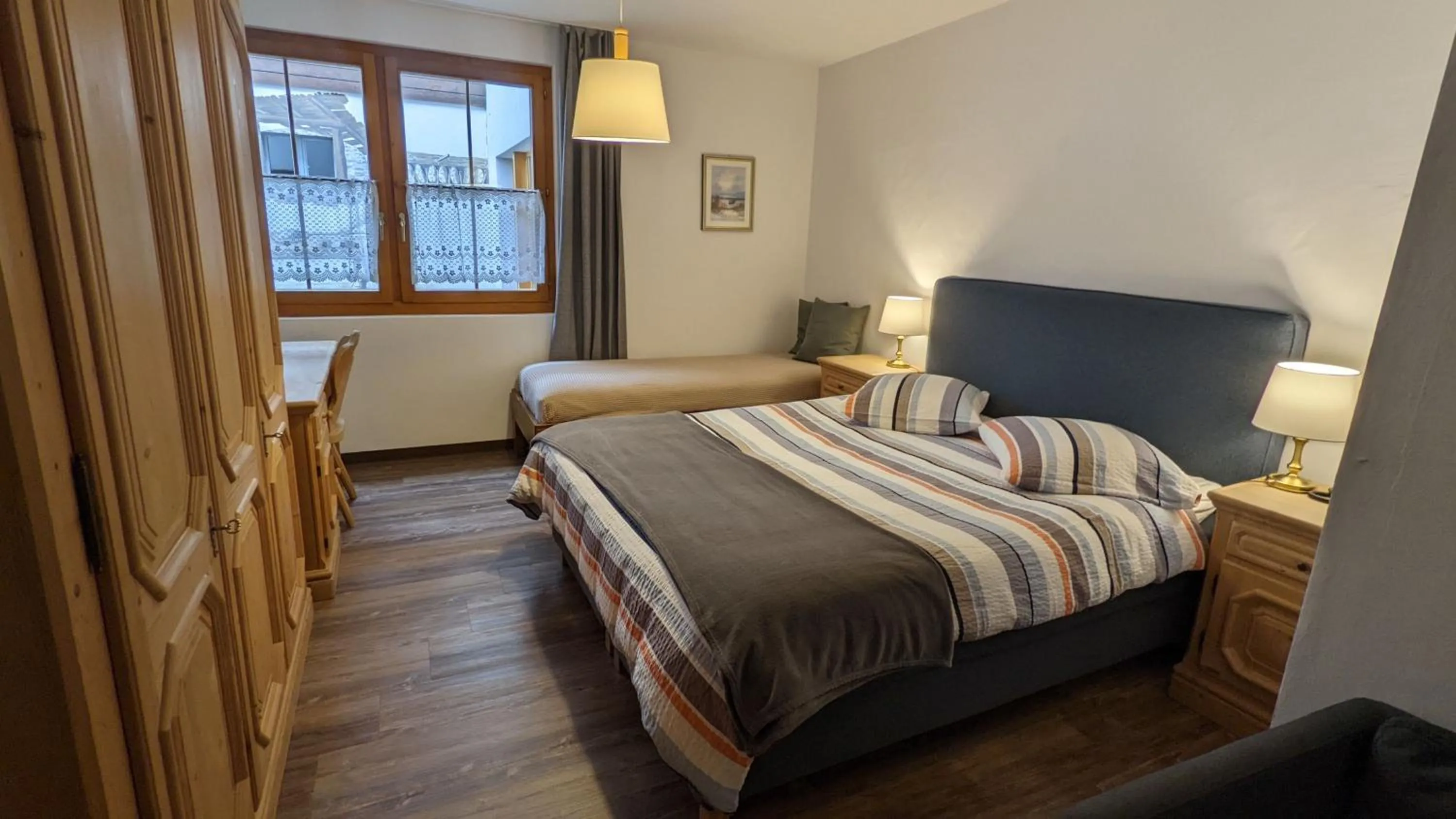 Bed in Hotel Beau-Séjour