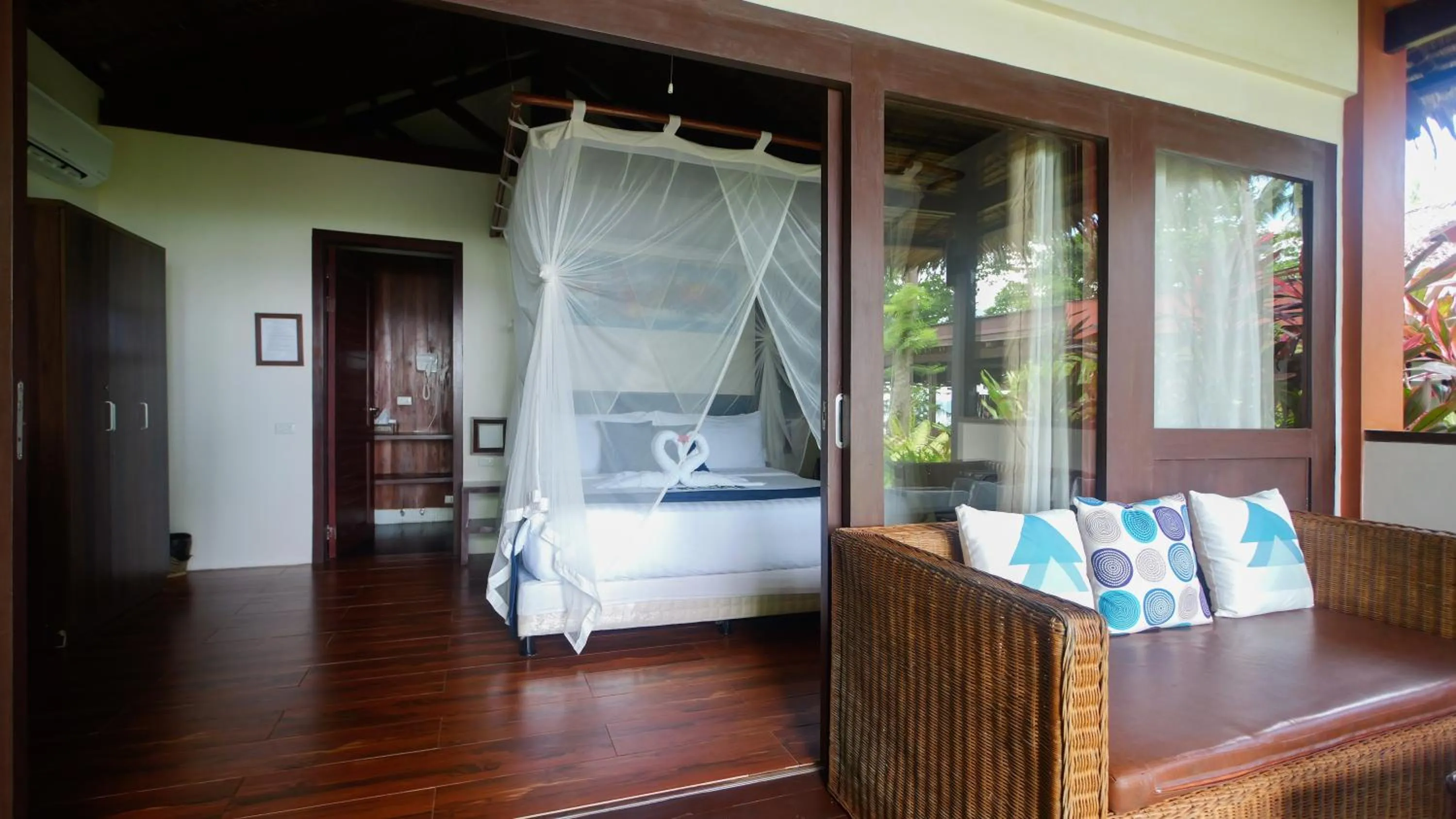 Photo of the whole room, Bed in Last Frontier Beach Resort - Adults Only