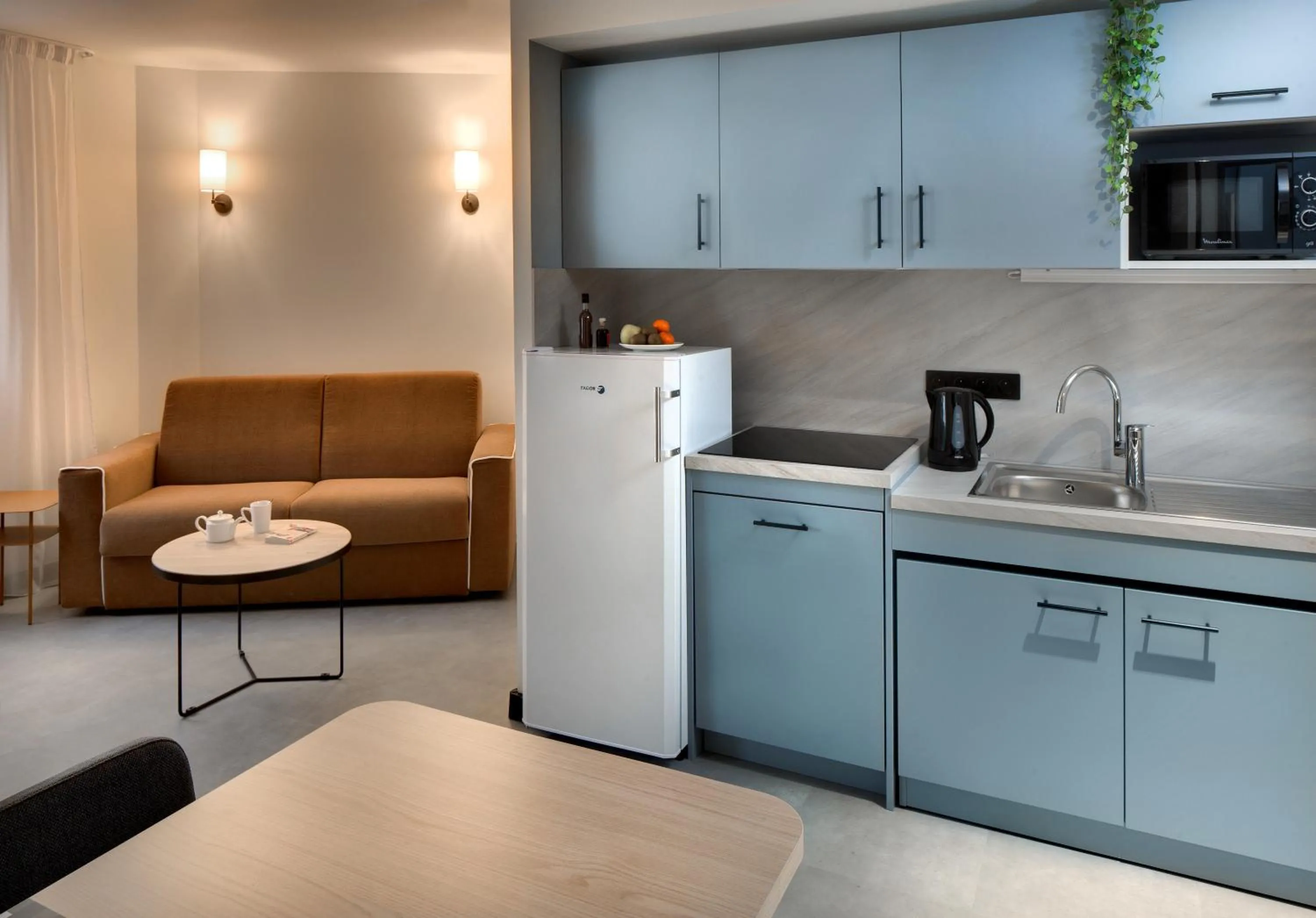 Kitchen or kitchenette in Résidence Callou by Vy Resort Thermal & Spa