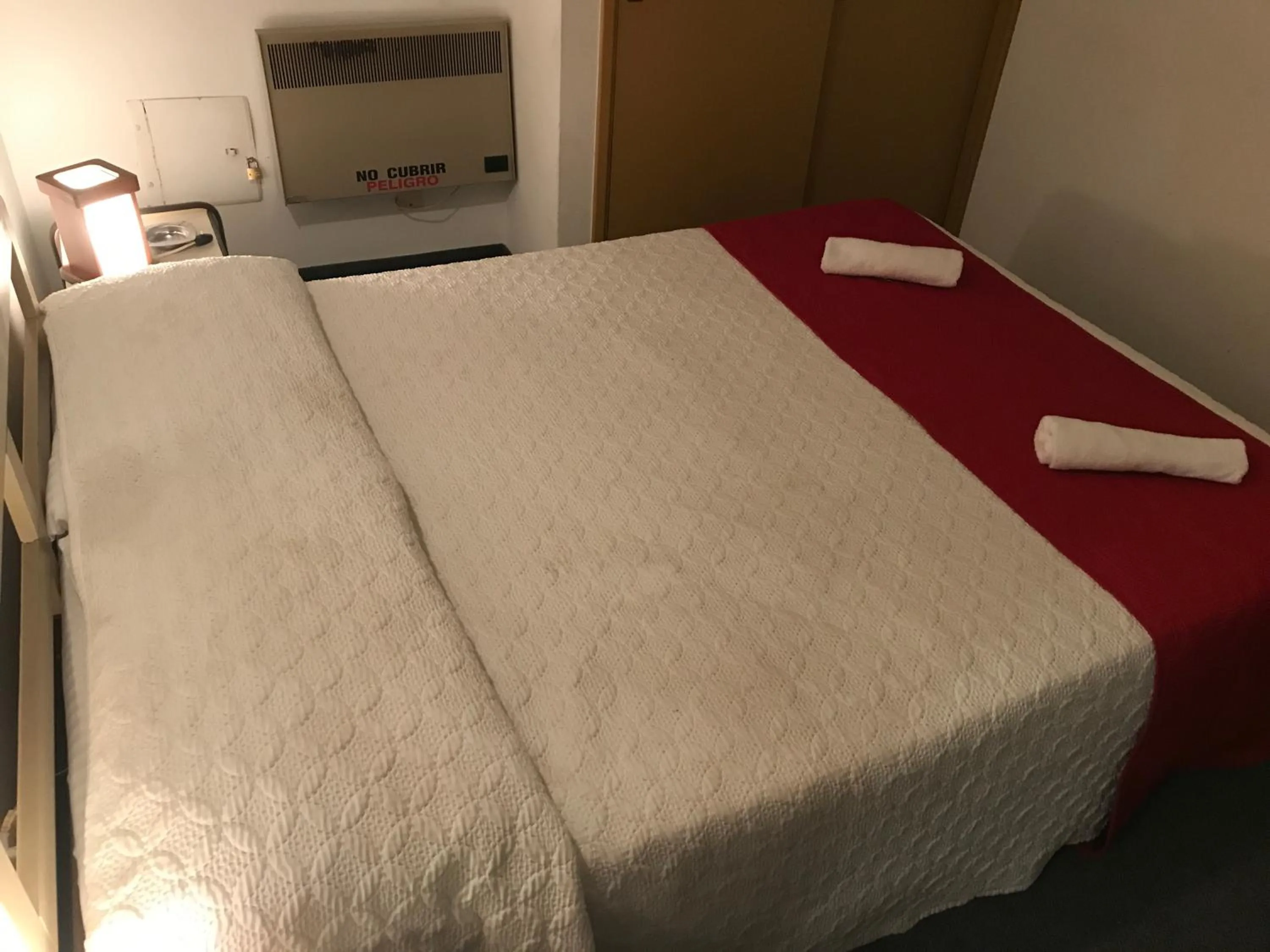 Bed in Hotel Antares