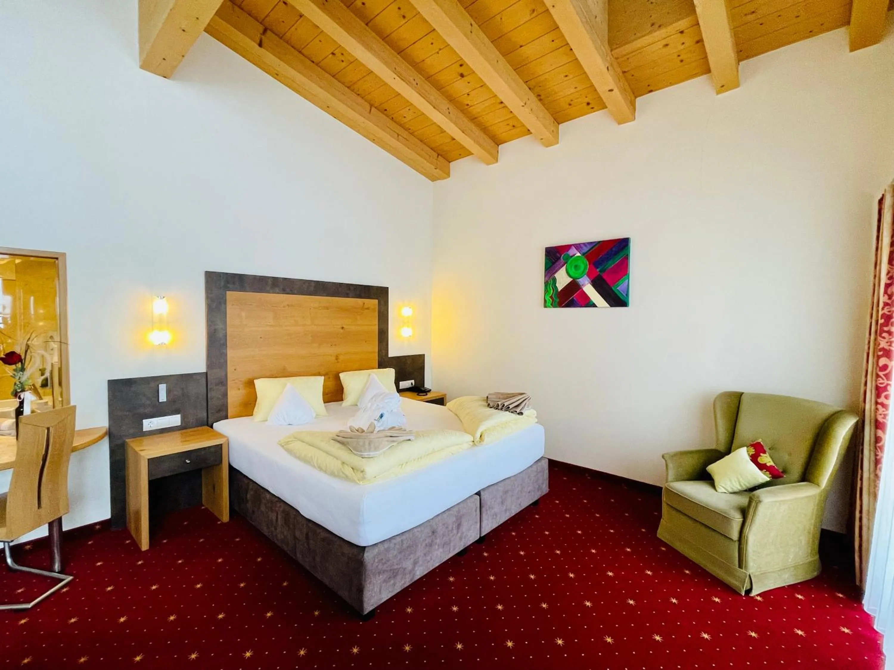 Photo of the whole room, Bed in Wellness- und Familienhotel Egger