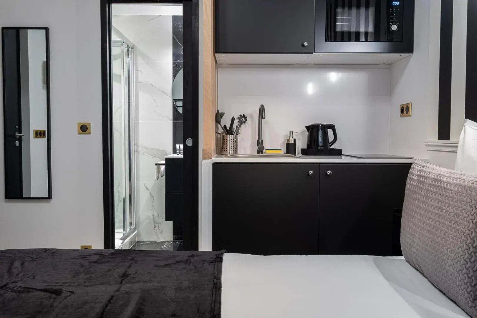 Bedroom in Mijo's Appartements Hôtel Bedroom in Mijo's Appartements Hôtel