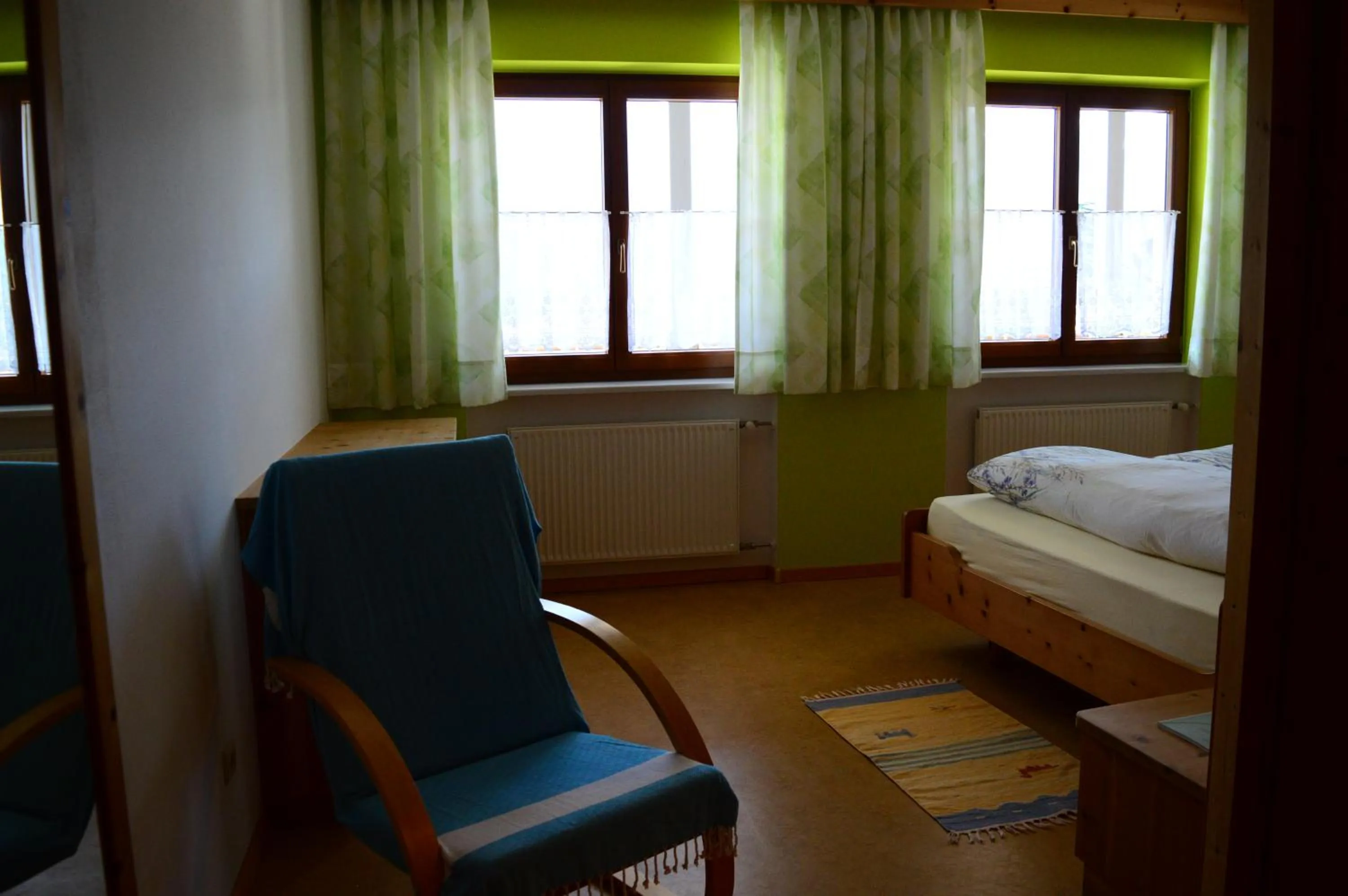 Seating area, Bed in Residence Sonnenburger - Biobauernhof - Azienda agricola biologica