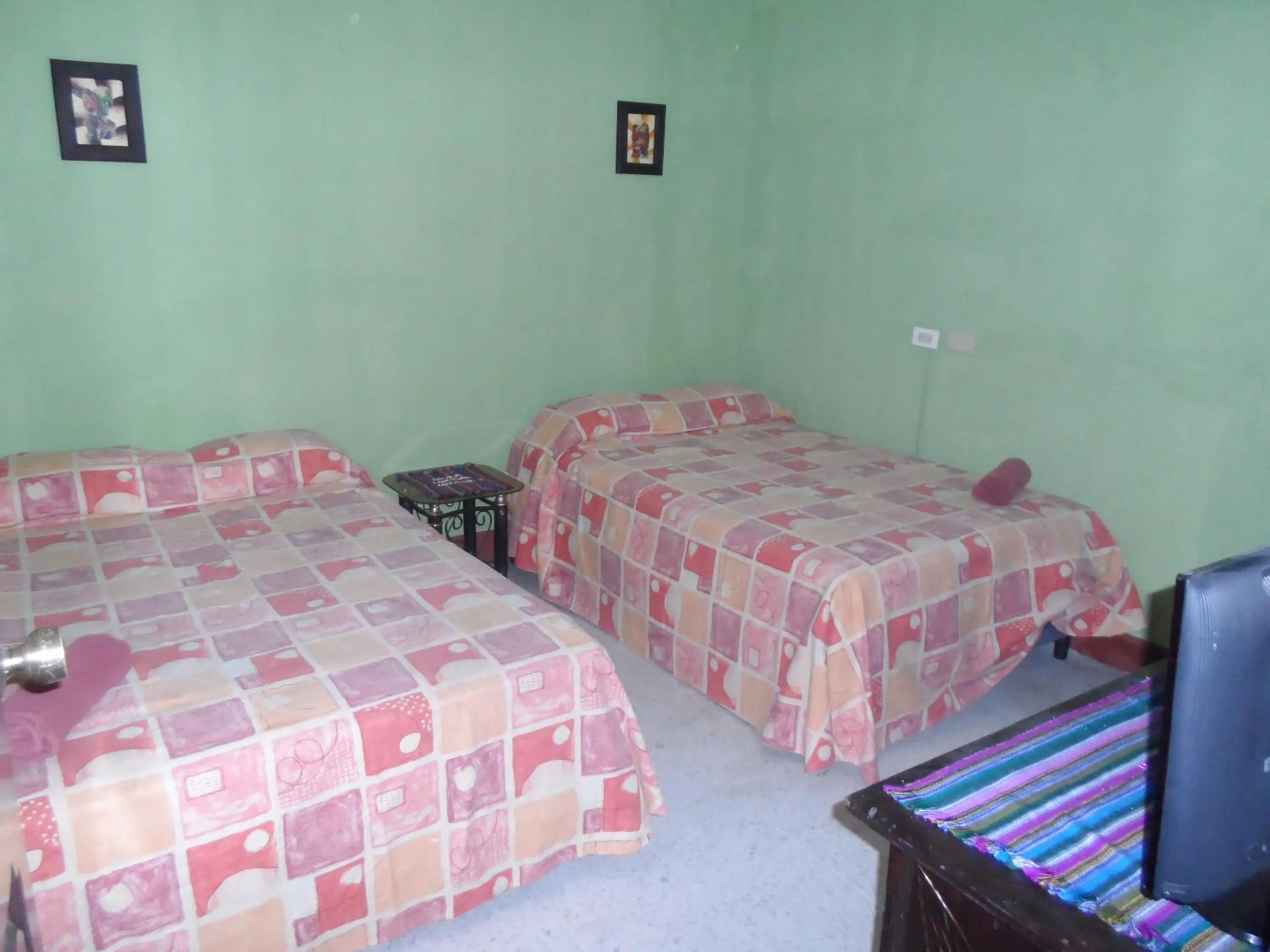 Bed in Casa Landivar Hotel
