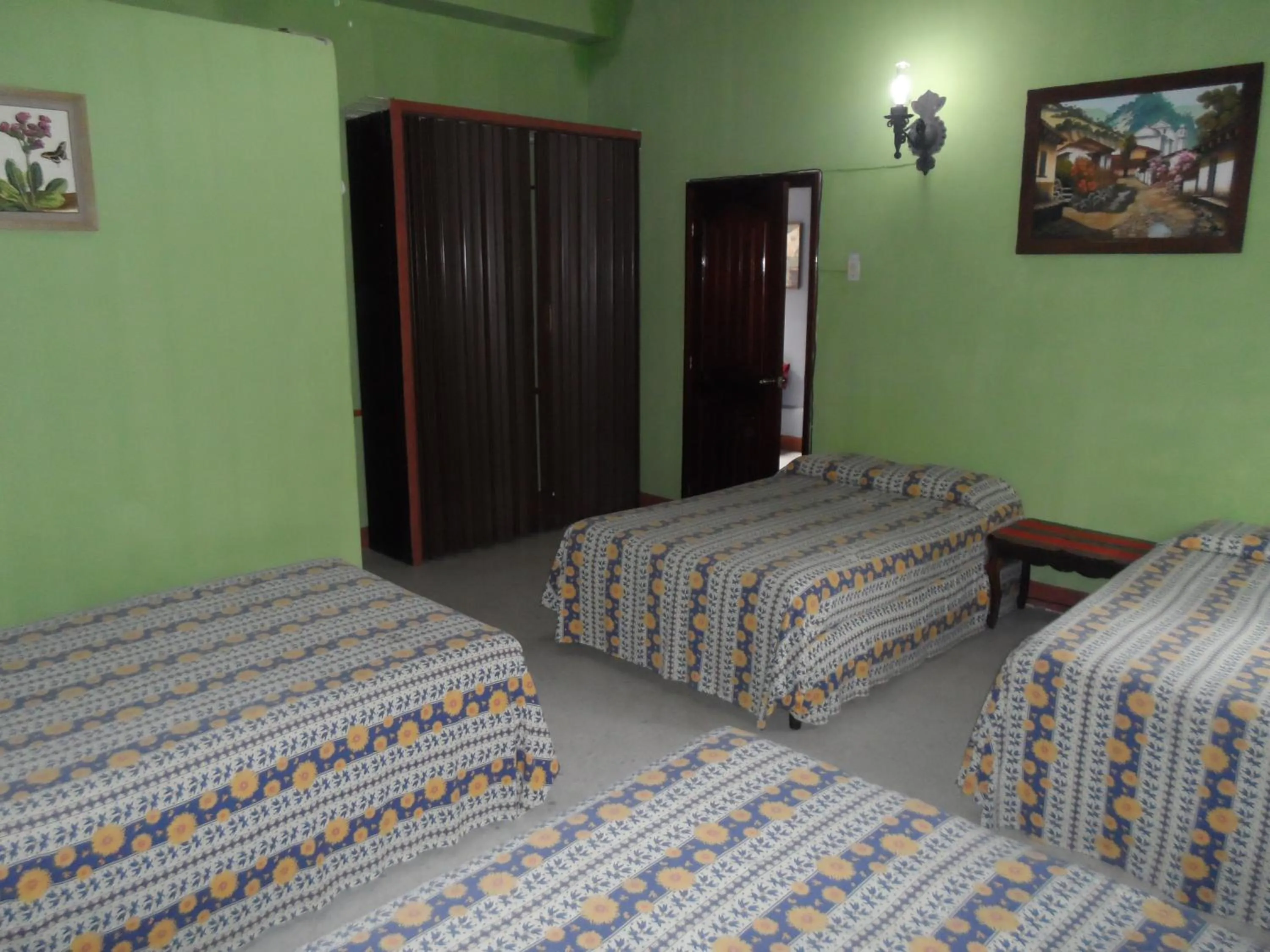 Bed in Casa Landivar Hotel