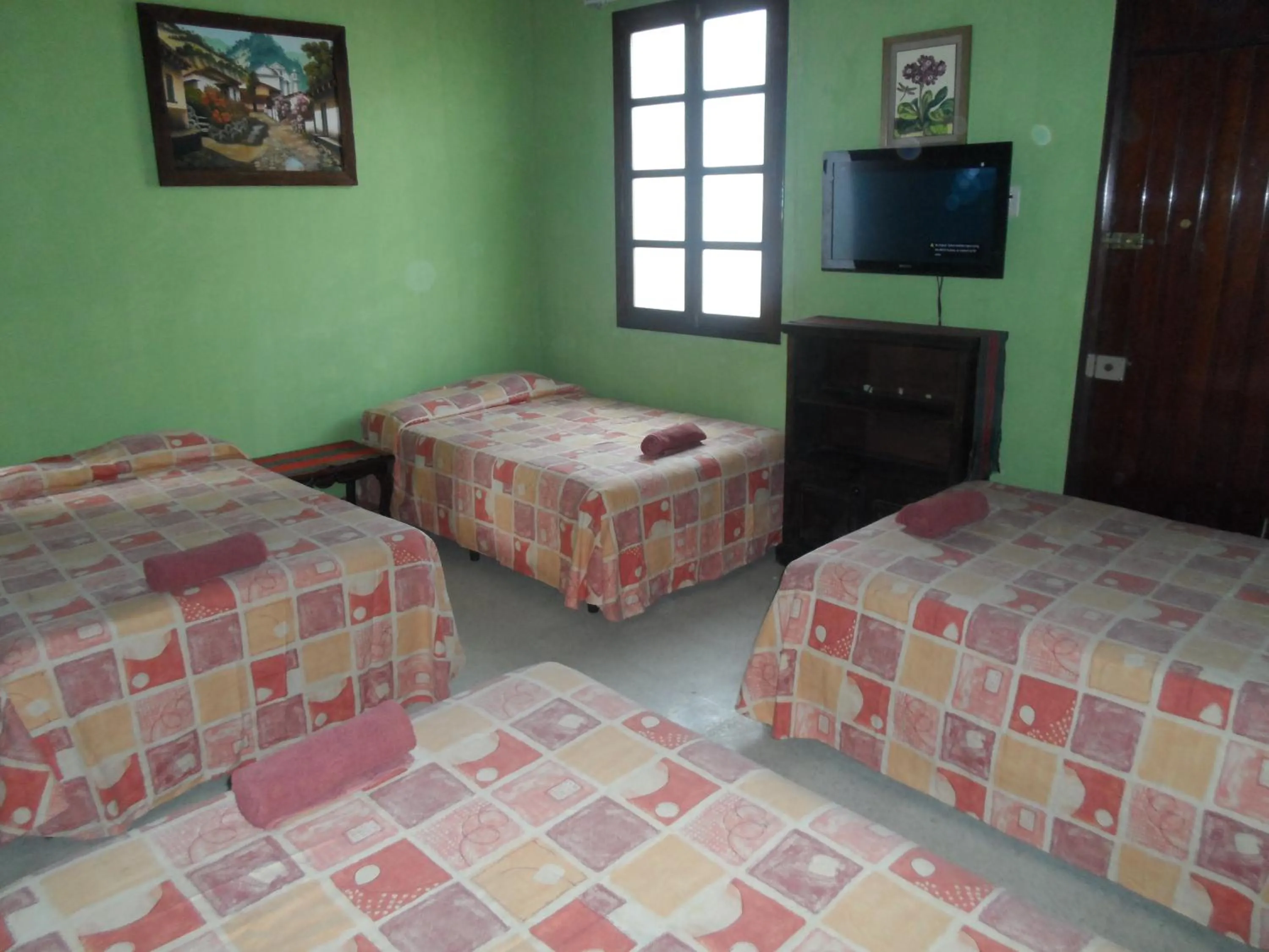 Bed in Casa Landivar Hotel
