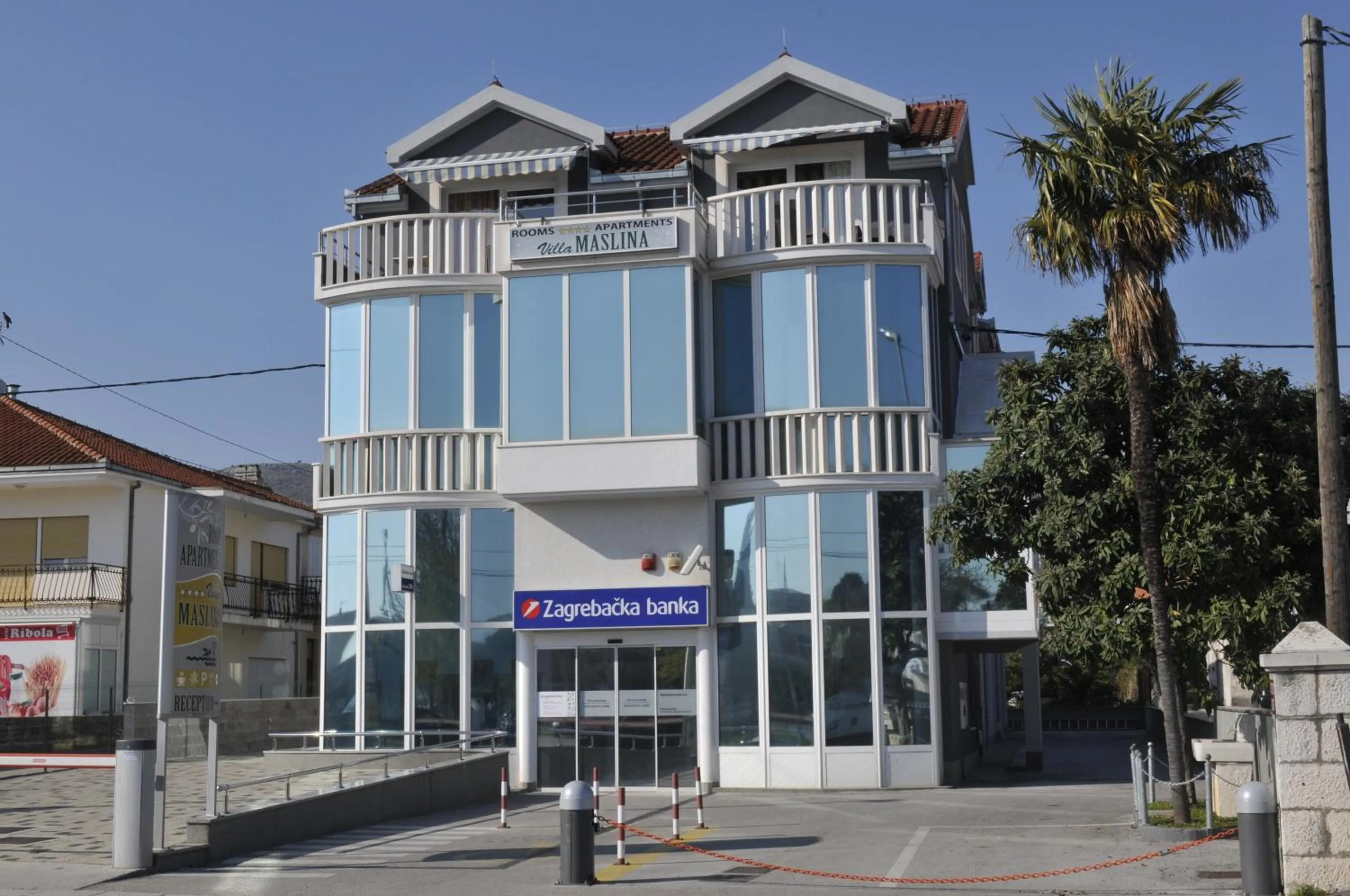 Property building in Apartments & Rooms Villa Maslina