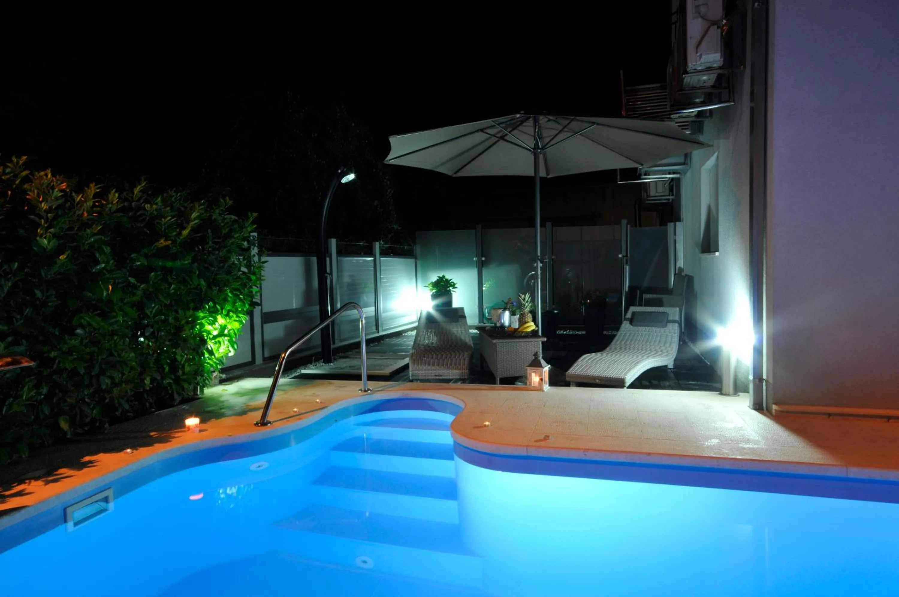Swimming pool in Apartments & Rooms Villa Maslina