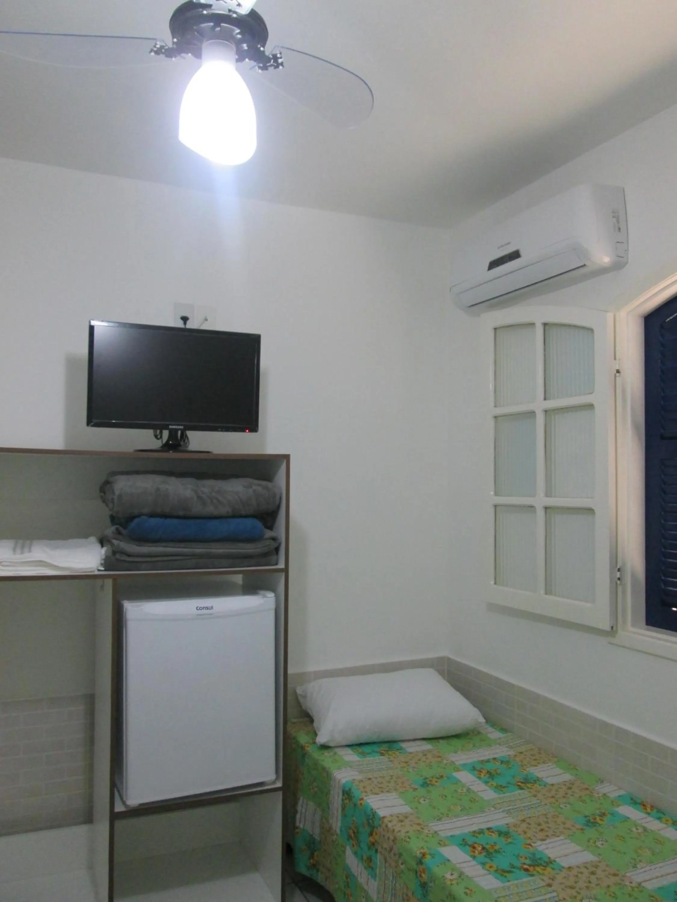 Bed in Pousada Bem Brasil