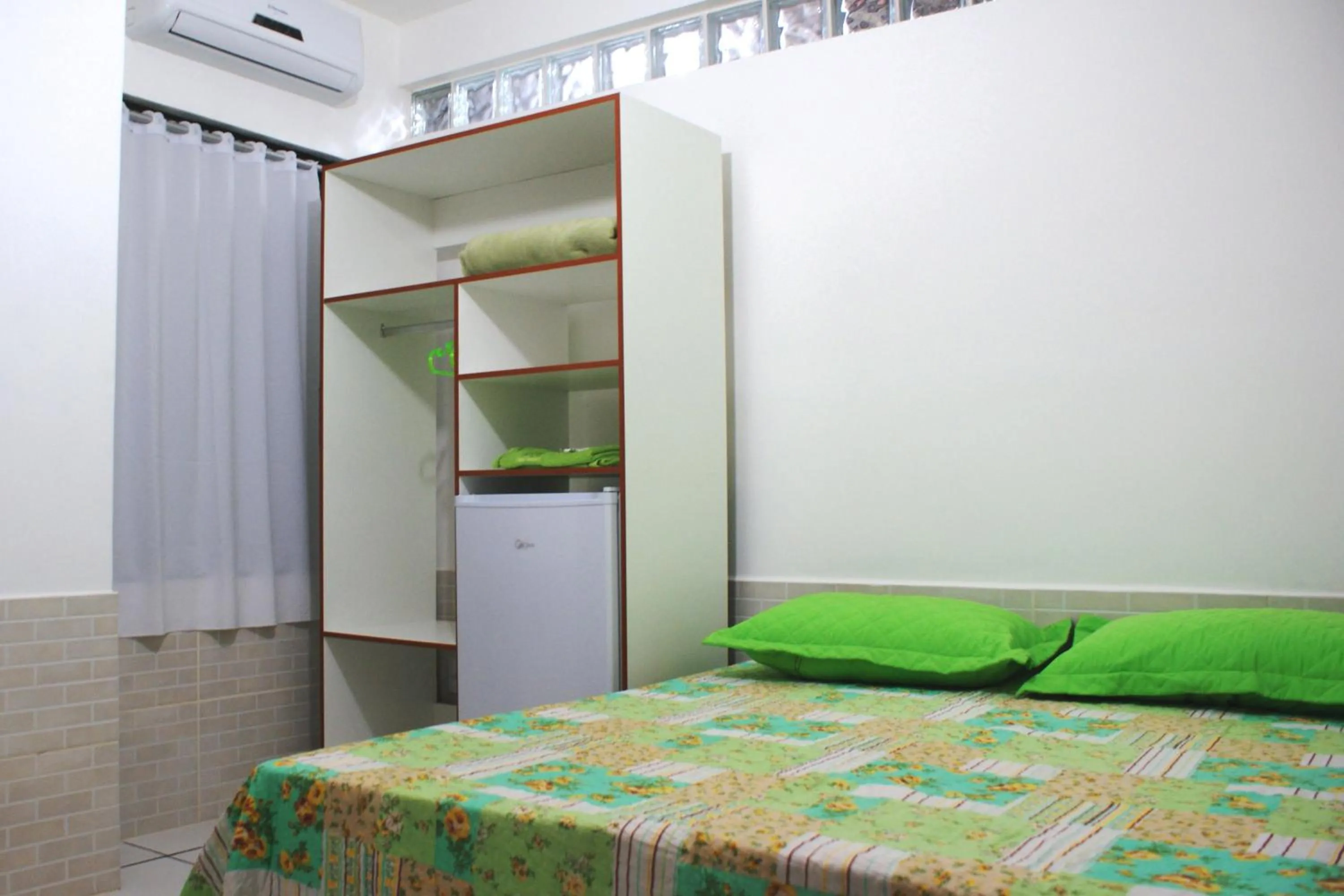 Bed in Pousada Bem Brasil