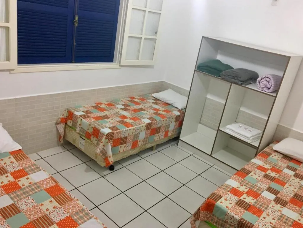 Bed in Pousada Bem Brasil