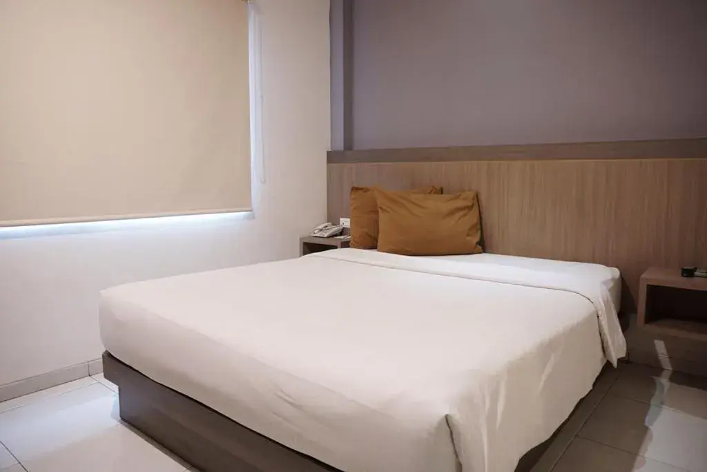 Bed in Dalu Hotel