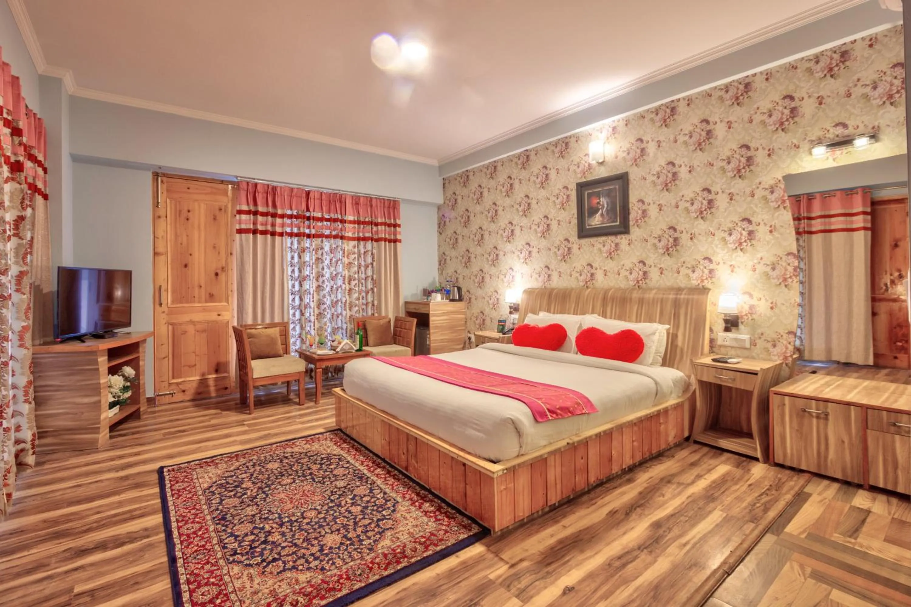 Bed in Snow Flakes Resort And Spa Centrally Heated Luxury Resort