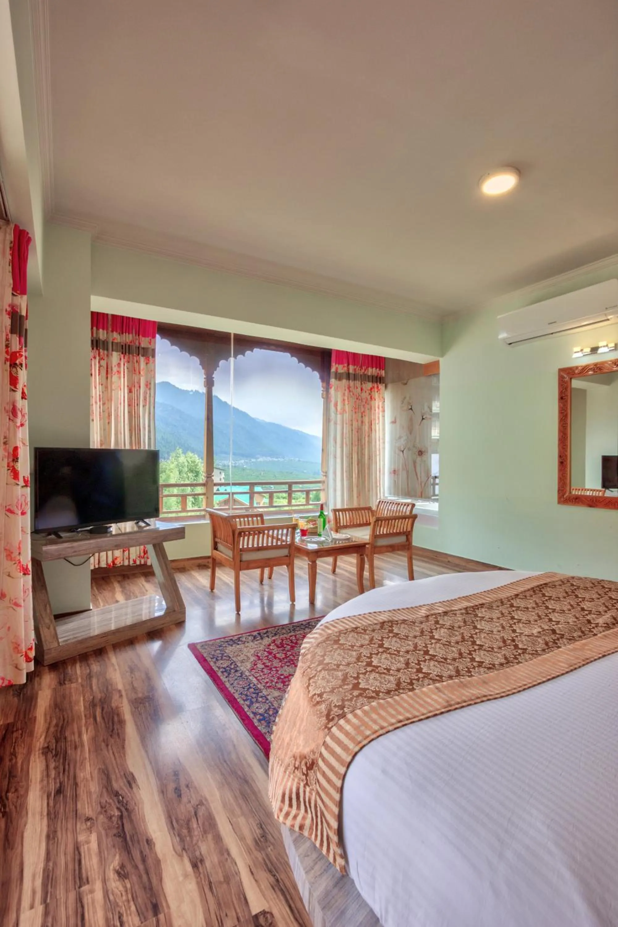 Living room, Bed in Snow Flakes Resort And Spa Centrally Heated Luxury Resort