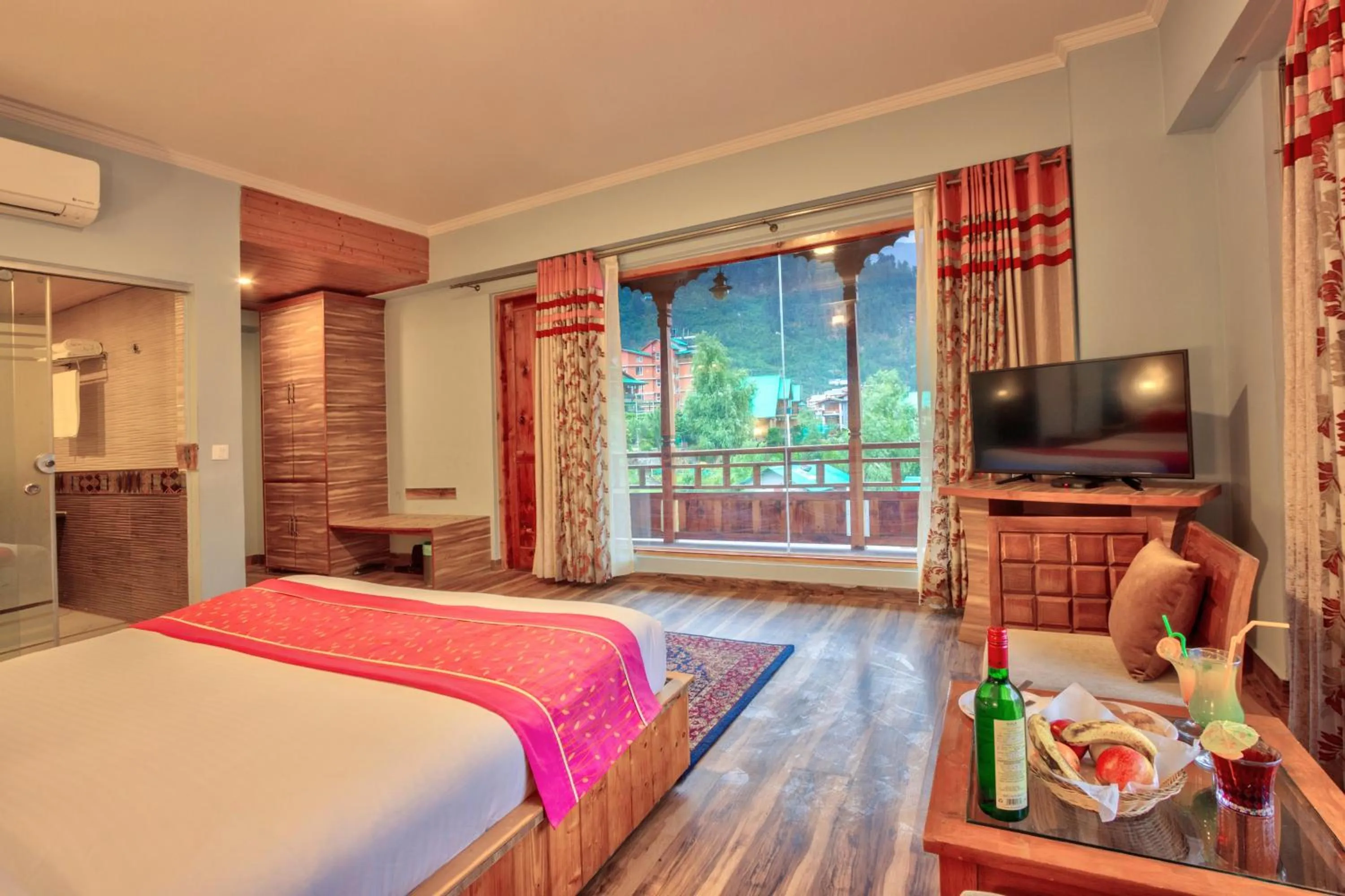 Communal lounge/ TV room, Bed in Snow Flakes Resort And Spa Centrally Heated Luxury Resort